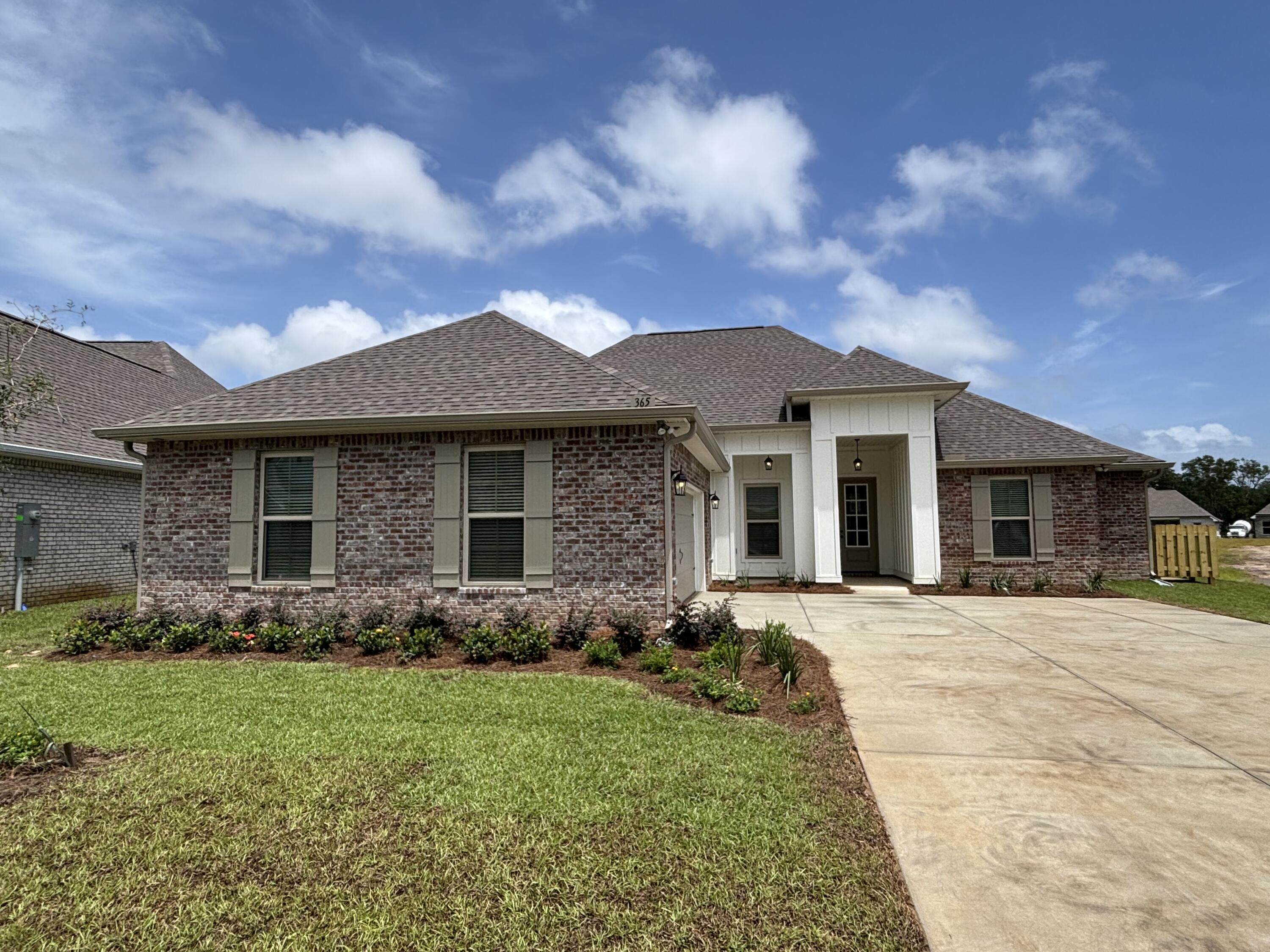 The KLEIN III H in Starburst at Hammock Bay community offers a 4BR/3BA, open design. Upgrades added (list attached). Features: double vanity, garden tub, separate custom tiled shower, and walk-in closet in master bath, tray ceiling in master bed, double vanity in 2nd bath, kitchen island, walk-in pantry, boot bench in mudroom, covered porches, undermount sinks, custom kitchen backsplash, crown molding, LED lighting, smart connect WIFI thermostat, framed mirrors in all baths, landscaping package, architectural 30-year shingles, flood lights, and more! Energy Efficient Features: water heater, electric kitchen appliance package, vinyl low E windows, and more! Energy Star Partner.