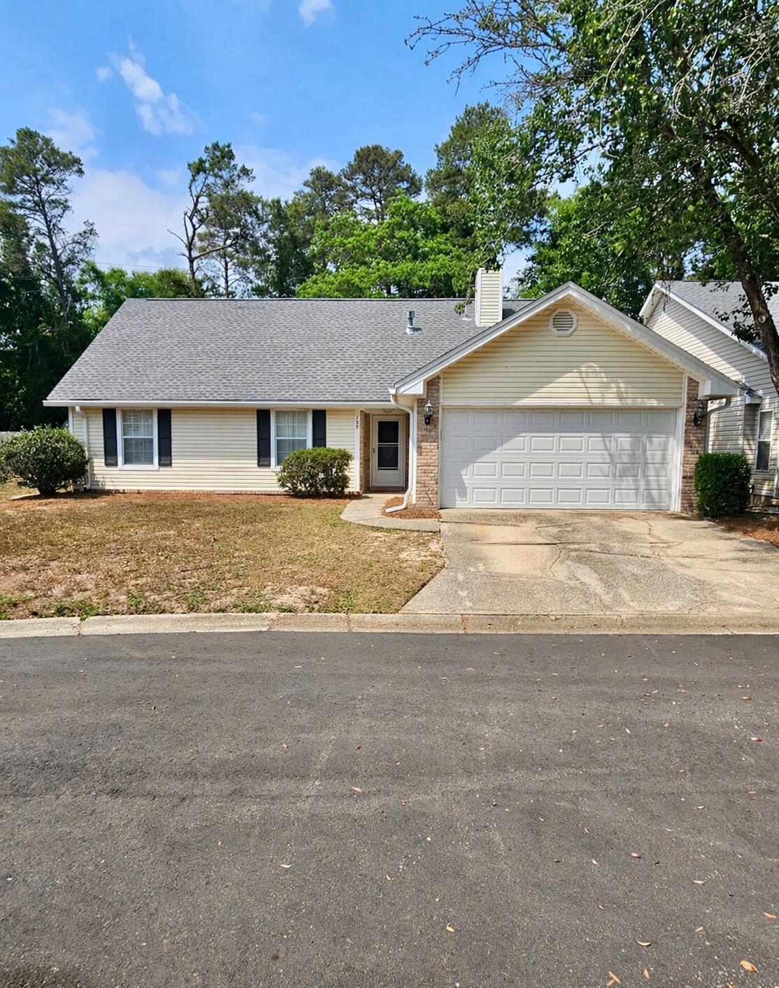 Tucked away on a quiet cul-de-sac in one of Niceville's most sought-after communities, this beautifully maintained home offers the perfect blend of space, comfort, and thoughtful updates—truly move-in ready.

The home features three bedrooms, two bathrooms, plus a spacious bonus room that easily functions as a fourth bedroom, home office, or flexible living space. Inside, vaulted ceilings create an open, airy feel, complemented by plantation shutters, a neutral color palette, and a wood-burning fireplace that adds warmth and character to the main living area. Updated flooring on the main level and new countertops provide a fresh, modern touch while preserving the home's inviting charm. Major system upgrades have already been completed, offering peace of mind for the next owner, including a new roof, water heater, and furnace.

Step outside to a fully fenced backyard featuring a spacious patio and newly installed Zoysia grassperfect for relaxing, entertaining, or enjoying everyday outdoor living. A two-car garage, along with additional nearby parking, adds extra convenience in this quiet cul-de-sac setting.

Located in Bluewater Bay, residents enjoy access to community pools, tennis courts, golf, and scenic walking and running paths throughout the neighborhood. All of this is just minutes from shopping and dining, with an easy drive to the Emerald Coast's world-famous beaches.

Exceptionally well cared for, thoughtfully updated, and ideally located, this home is a standout opportunity in Niceville. Come see why this is a place you'll truly love to call home.