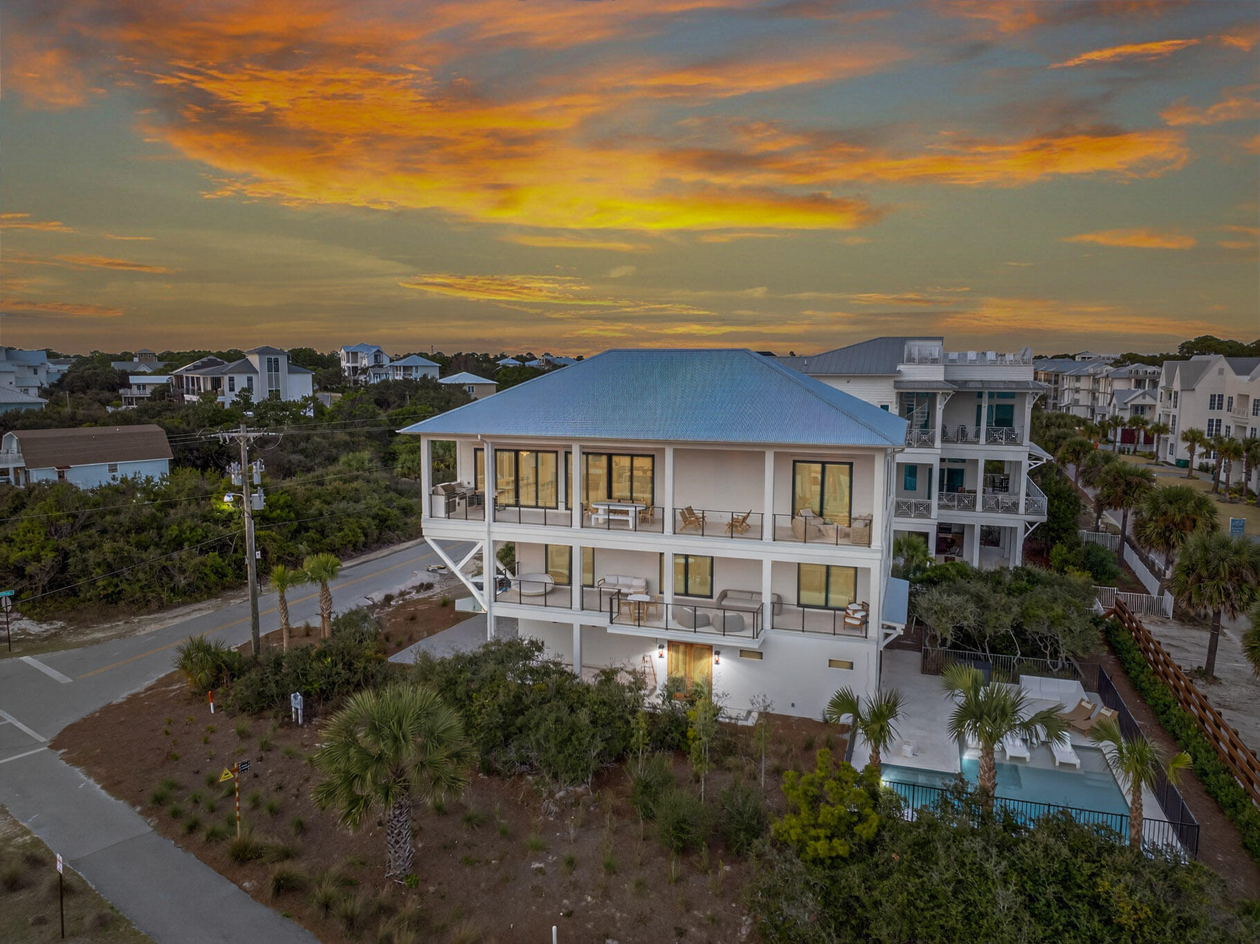 Perfectly oriented along the iconic coastline of Scenic 30A in Santa Rosa Beach, 26 Hilltop Drive is a newly constructed Gulf-view architectural masterpiece that embodies the pinnacle of modern coastal luxury.
This residence seamlessly blends sophisticated contemporary architecture with the relaxed elegance of life along the Emerald Coast. Sweeping Gulf views, soaring architectural ceilings, expansive covered terraces, and impeccably curated interiors create a home that feels both grand in scale yet remarkably intimate in experience.
From the moment you enter, the residence unfolds through a series of dramatic designer spaces defined by artisan materials and gorgeous lighting, inviting you to an extraordinary outdoor living experience at the pool, flanked by a massive outdoor kitchen pavilion. Wide-plank vaulted wood ceilings, stone flooring, custom millwork, and expansive walls of glass establish a refined modern aesthetic carried throughout the home.
At the center of the residence, a stunning kitchen, inspired by famed chef Jim Richard, and a vaulted great room, creating an unforgettable entertaining environment designed for large-scale gatherings and elevated coastal living. Dual oversized waterfall stone islands anchor the space, complemented by custom white oak cabinetry, premier appliances, a custom vent hood, two pantry's, curated architectural lighting, elegant drapery, all accentuated by a fabulous fireplace and a breathtaking, sweeping view corridor to the... Emerald Green water of the Gulf within 200' from this resort enclave's front entry and pool. 
The adjacent Gulf-facing living and dining areas seamlessly transition onto expansive covered terraces designed to capture the beauty of the coastline from sunrise to sunset. Multiple outdoor lounge and dining spaces create a true indoor-outdoor resort experience.
The primary suite is a private sanctuary unto itself -- soaring ceilings, a tranquil sitting area, custom designer finishes, private terrace access, and stunning Gulf views that create an atmosphere rivaling the world's finest boutique resorts. Spa-inspired baths throughout the home showcase intricate stone craftmanship, floating vanities, and luxury hospitality-level detail.

Additional features include oversized garage with electric car charging and secured storage; thoughtfully designed accommodations ideal for both full-time luxury living and premier vacation rental potential.
Every element of 26 Hilltop Drive has been intentionally designed and crafted to deliver a balance of architectural sophistication, warmth, comfort, and timeless coastal elegance -- all located just across from the sugar-white sand beaches and Caribbean-like Emerald waters of Florida's most coveted coastline.