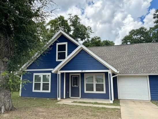 This exceptional 3 bedroom, 2 bath residence situated on a corner lot is now available for lease. Upon entry, you will appreciate the contemporary design that is evident throughout the home. The flooring is comprised of durable vinyl planking, providing a carpet-free living environment. The spacious open floor plan facilitates seamless flow between the living areas. The kitchen is outfitted with stainless steel appliances (fridge/freezer, dishwasher, microwave, and stove), a pantry, an additional storage closet, a breakfast bar, and elegant new shaker-style cabinetry. The master suite, conveniently located on the first floor, offers ease of access. The master bathroom is designed with a walk-in tiled shower and a 4 ft. vanity. A generously sized laundry room is situated on the first floor. The second and third bedrooms are located upstairs, accompanied by a full bath and additional storage options. This property features a one-car garage and outside, there is a covered patio ideal for peaceful relaxation.