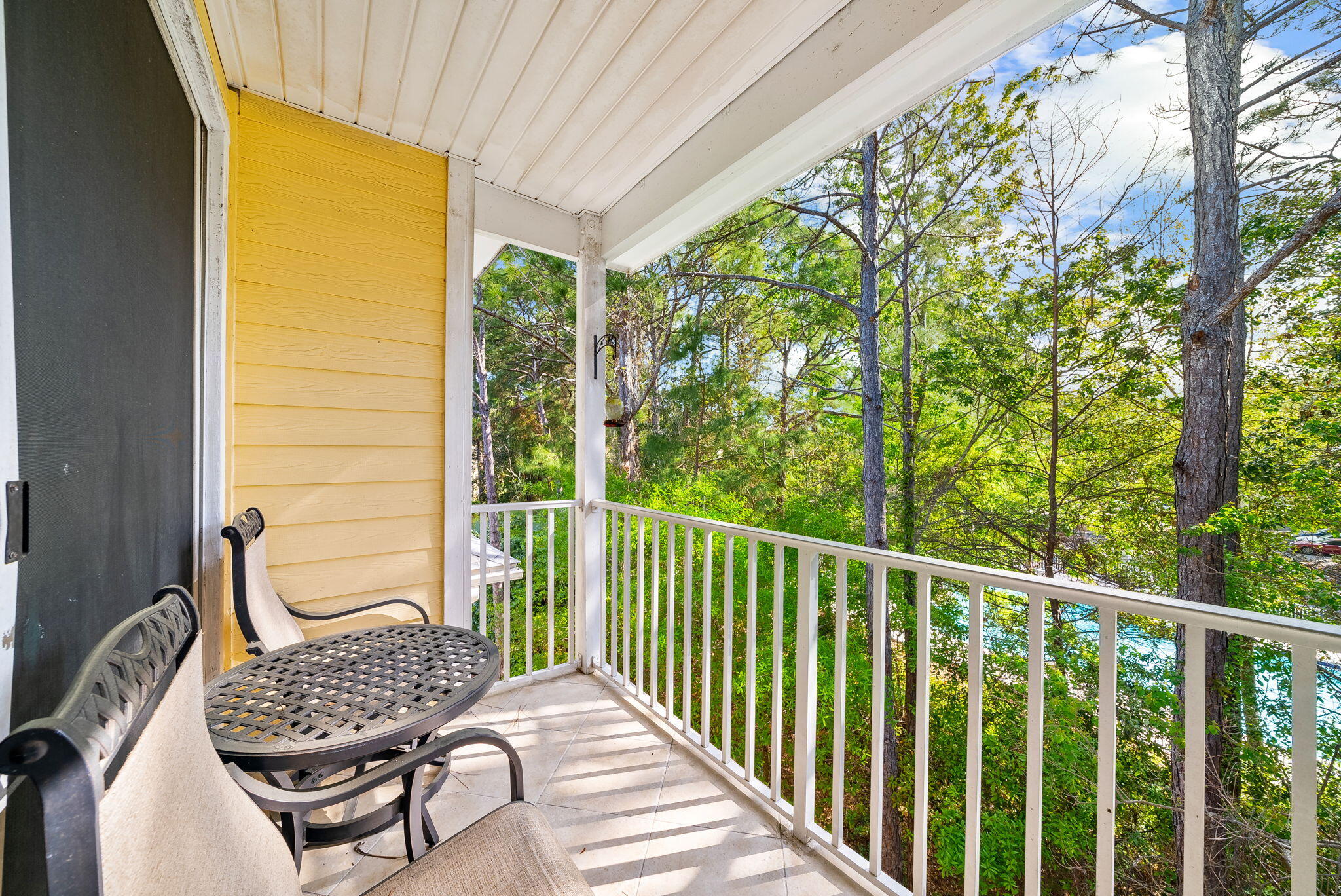 Fully furnished and currently the lowest-priced 2-bedroom condo at Pointe of View Condominiums, this top-floor unit offers an exceptional opportunity to own along the Emerald Coast. Ideally positioned near the stairwell for convenient access, the unit overlooks a peaceful green space, providing added privacy, quieter living with no upstairs neighbors, and enhanced views.

Head inside to discover this turn-key 2-bedroom, 2-bathroom condo featuring an open-concept kitchen that flows seamlessly into a spacious living area. Unit #1009 boasts a premier location and a private balcony overlooking serene natural surroundings which offers both privacy and the perfect place to unwind after a long day. Located in the heart of Miramar Beach, Pointe of View is just moments from the Shops at Grand Boulevard, offering a variety of upscale dining, shopping, and entertainment options. Nearby conveniences include Publix, Sacred Heart Hospital, and the renowned Sandestin Golf & Beach Resort. The sugar-white sands and emerald waters of the Gulf are just a short drive away, along with easy access to Scenic Gulf Drive and the scenic communities along 30A.

Residents enjoy amenities such as a community pool and fitness center, along with ample parking for owners and guests. The condominium allows short-term rentals, making this an attractive option for investors seeking income potential, as well as buyers looking for a second home or low-maintenance primary residence.

Whether you're searching for a turnkey coastal retreat or an income-producing property in a high-demand area, this condo delivers convenience, lifestyle, and value in one of the most desirable locations along the Gulf Coast.