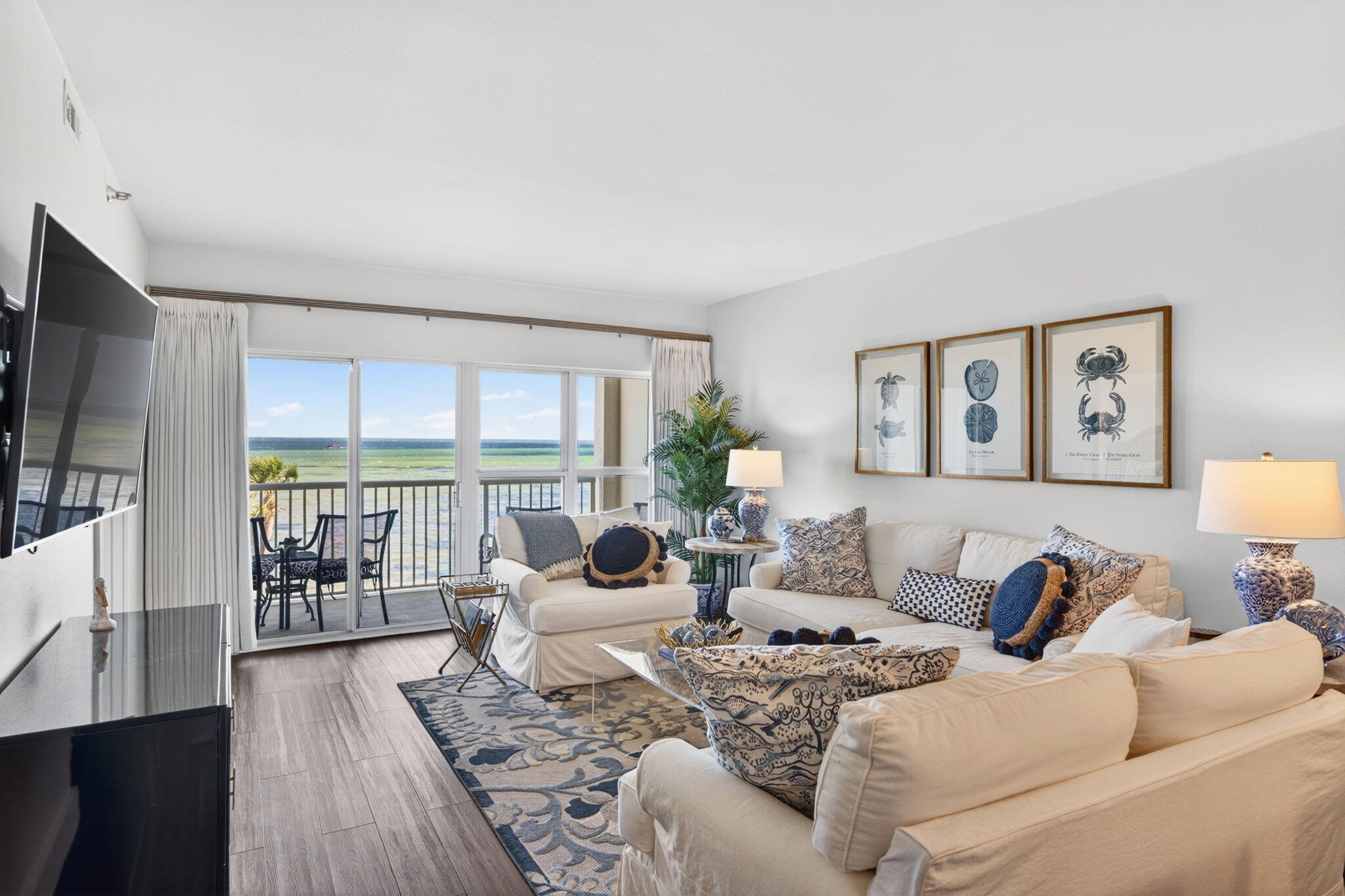 Players Club in Sandestin Golf and Beach Resort, where the million $ views of Choctawhatchee Bay, weekly fireworks displays and sunsets are serene and panoramic. Picture yourself on your private balcony watching dolphins, pelicans and mullet  or winding down summer evenings while enjoying the bay breezes.This coastal inspired updated condo is offered FULLY FURNISHED, one assigned parking space and a 6-SEATER GOLF CART! The master bedroom provides tranquil bay views  and the sizeable ensuite bath with walk in closet, dual vanities and an upscale frameless shower.This maintenance free condo  makes an ideal vacation rental property or primary residence. Player's Club is a smaller boutique building with a FULLY FUNDED budget, both mandated reports and studies were completed in '24 Sandestin Golf and Beach Resort features more than seven miles of beaches and pristine bay front, four championship golf courses, 15 world-class tennis courts, pickleball courts, 108 catch and release ponds stocked with bass (no fishing license required), a 226-slip marina, a fitness center, spa and celebrity chef dining. Shop, dine and play at the charming pedestrian village, The Village of Baytowne Wharf and more. Inside the gates of the resort, residents of the 72 distinctly different neighborhoods enjoy a balanced lifestyle of high-class living, spanning 2,400 acres from the beach to the bay. There are just over 4600 properties within the gates which offer 24 hrs./day gated security. Everything within the gates of the resort is accessible by golf cart or bicycle. The entire resort is interconnected by miles of pedestrian, bike and golf cart paths that weave through groves of live oaks, meandering past natural lagoons, fountains, man-made lakes, and meticulously landscaped fairways.
Just beyond the gates, Grand Blvd with its weekly farmers market, varied events and superb section of dining and shopping is readily accessible by golf cart. The Market Shops, on the south side of highway 98, boasting more dining and shopping choices, is easily accessible utilizing the tunnel beneath Hwy 98