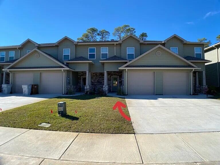 Experience low-maintenance living in this beautifully designed luxury townhome, ideally located with convenient access to Hurlburt Field, Gulf Breeze, and everything the Emerald Coast has to offer. The HOA takes care of the lawn maintenance, allowing you more time to enjoy the community pool and the Florida lifestyle.

The thoughtfully designed open-concept floor plan is perfect for both everyday living and entertaining. The main level features luxury vinyl plank flooring throughout, offering both style and durability with easy upkeep. The well-appointed kitchen is complete with granite countertops, stainless steel appliances including a refrigerator, range, microwave, and dishwasher, ample cabinetry, and a seamless flow into the living and dining areas.

Upstairs, the private primary suite provides a relaxing retreat with a spacious walk-in closet and an ensuite bathroom featuring dual sinks, a comfort-height vanity, and granite countertops. A conveniently located upstairs laundry area adds to the home's functional design.

Whether you're searching for your primary residence, a second home, or an investment opportunity (short term rentals are allowed), this luxury townhome offers modern finishes, a carefree lifestyle, and an unbeatable location close to shopping, dining, beautiful beaches, and area military bases.
