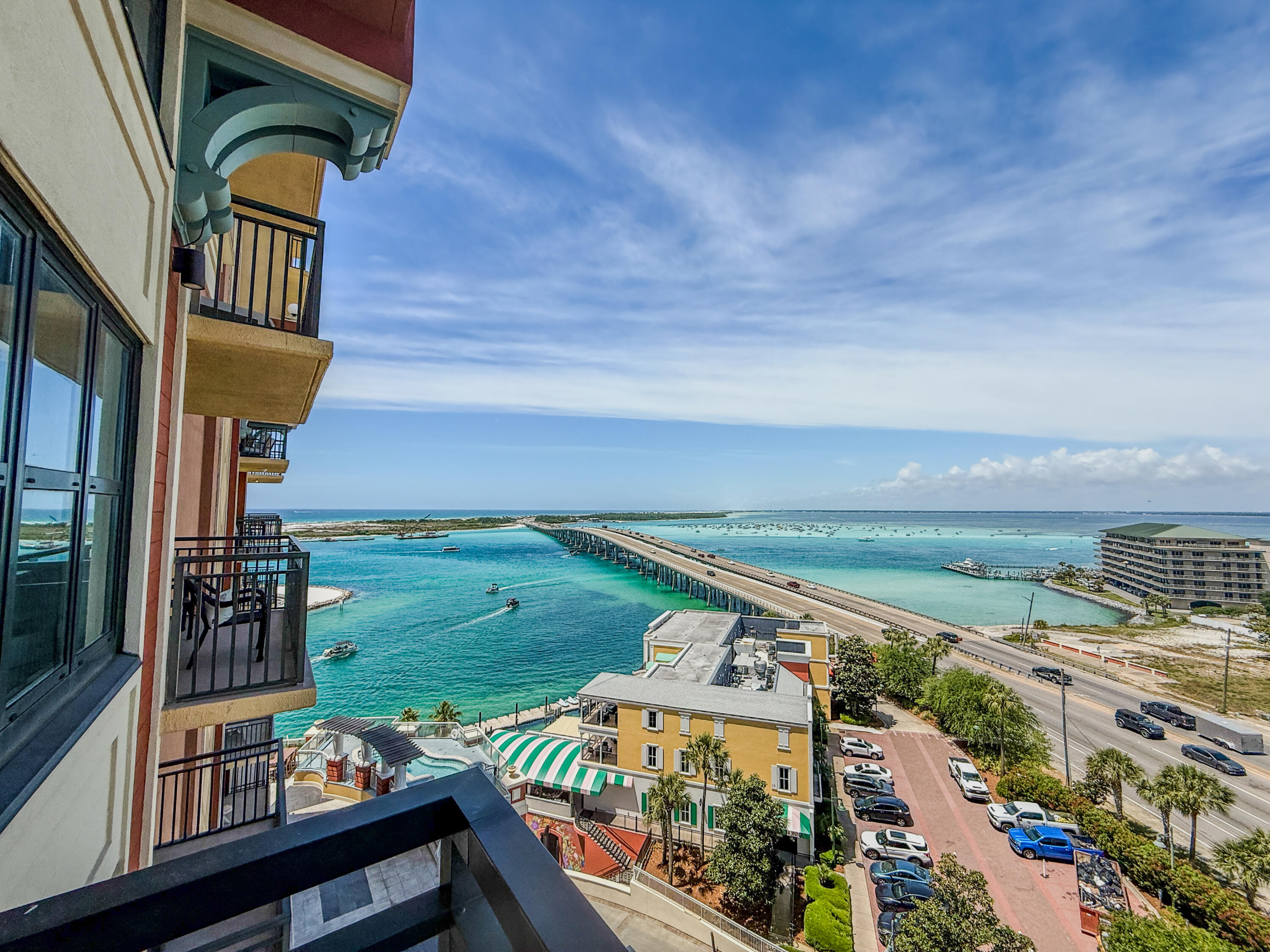 Enjoy the best of Destin's waterfront lifestyle in this 3-bedroom, 3-bath condo with 1,566 square feet of comfortable, well-planned space at Emerald Grande at HarborWalk Village. Two private balconies offer sweeping views of the Destin Bridge and Crab Island, where you can take in breathtaking sunsets from both the outdoor spaces and inside the fully updated residence. Ideal for vacation rentals, this fully furnished, rental-ready property offers resort-style amenities, world-class dining, and immediate access to Destin's top attractions, water activities, and nightlife.
