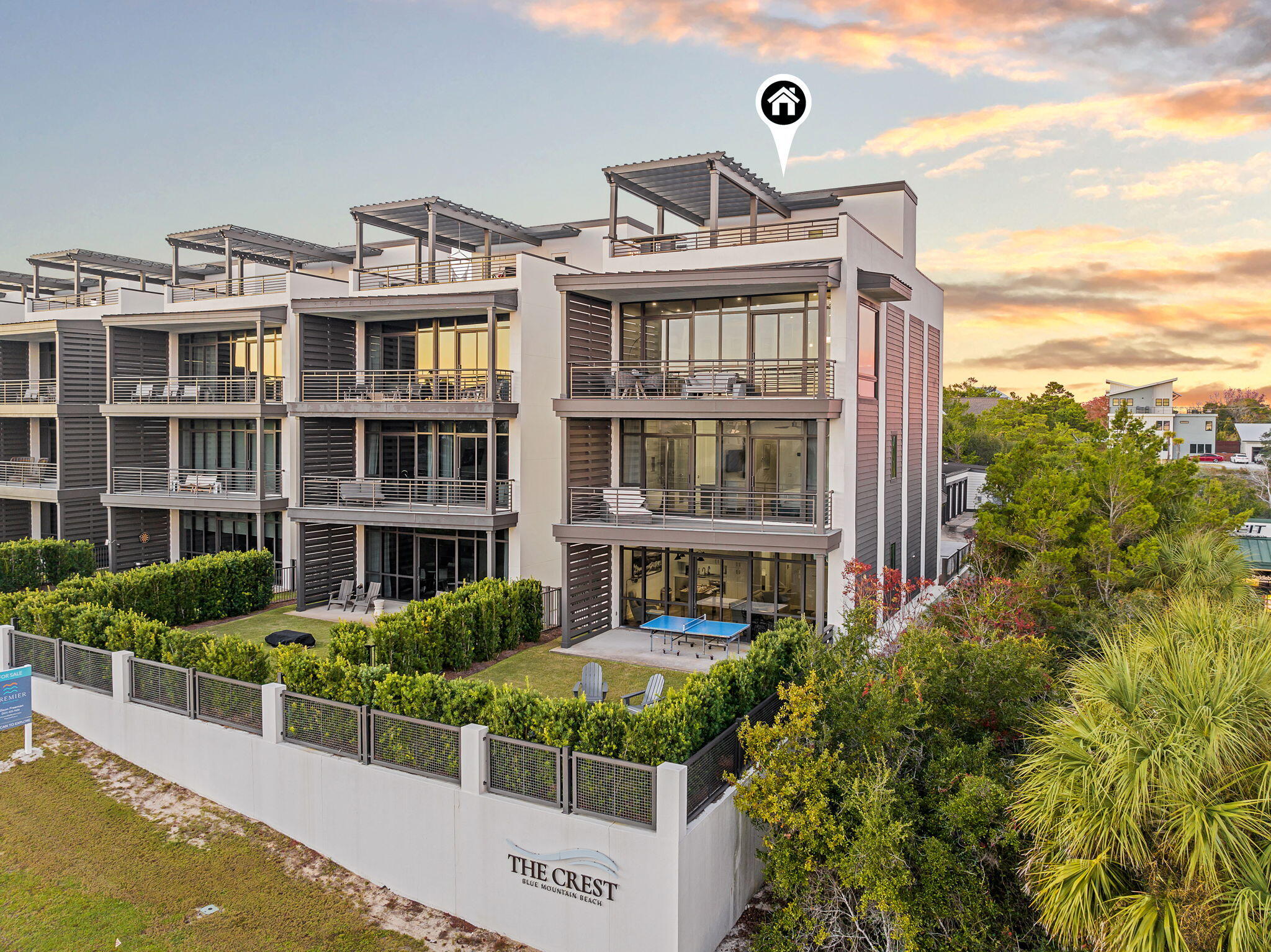 2174 W County Highway 30A is a modern coastal residence set within The Crest, one of the most discreet and architecturally intentional communities along Scenic Highway 30A. Built in 2020, the home spans approximately 3,500 square feet and presents a rare balance of contemporary design, privacy, and livability in a highly coveted coastal setting.

Defined by clean lines and expansive glass, the home is filled with natural light and framed by Gulf views. The interior layout is both thoughtful and flexible, offering five bedrooms, five full baths, and two half baths, along with multiple living areas designed to accommodate everyday living as well as entertaining with ease. An elevator services all levels, allowing the home to live comfortably for a wide range of buyers. A standout feature of the residence is the rooftop terrace, which captures panoramic Gulf views stretching from Destin toward Panama City. This elevated outdoor space enhances the coastal experience and serves as a natural extension of the home. At ground level, a private fenced yard and poolside cabana create a quiet retreat, while a two car carport, dedicated golf cart garage, and included golf cart add convenience and functionality.

Residents of The Crest enjoy access to a heated community pool and spa, offering a resort style amenity while maintaining a sense of privacy. Positioned directly on Scenic Highway 30A, the property is moments from the beach, dining, and the lifestyle that defines South Walton.

Equally compelling as a primary residence, second home, or luxury rental, 2174 W County Highway 30A offers a refined coastal opportunity anchored in strong design, thoughtful execution, and long term appeal.
