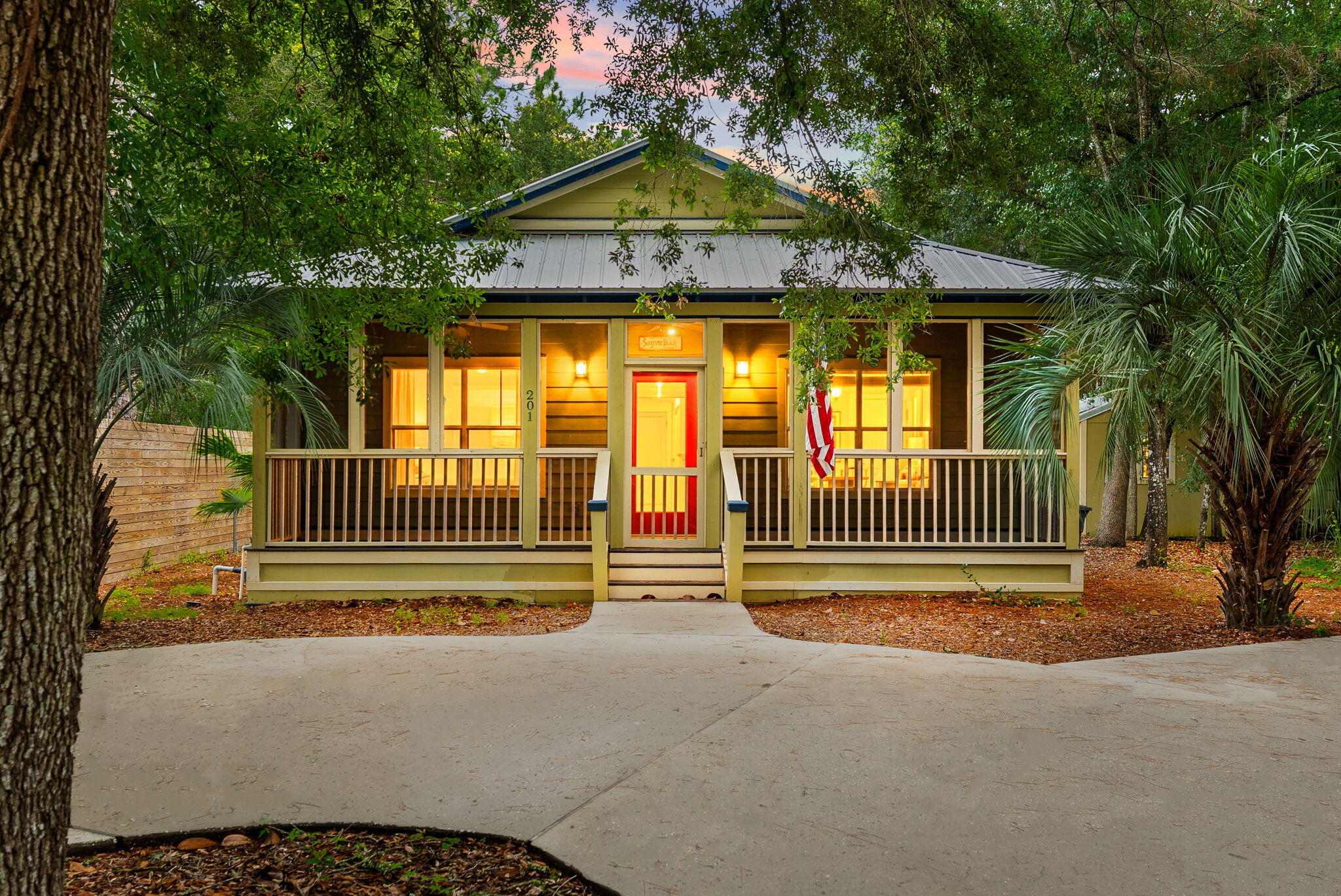 Nestled beneath a canopy of mature oaks in the highly desirable Point Washington community, this charming 3-bedroom, 3-bath coastal cottage offers the perfect blend of privacy, character, and convenience. Set on a wooded homesite just moments from Choctawhatchee Bay and the beaches of South Walton, this home embodies the laid-back Florida lifestyle.
Inside, vaulted ceilings, abundant natural light, and beautiful hardwood floors create an open and inviting living space. The kitchen features stainless steel appliances, ample cabinetry, and a breakfast bar overlooking the spacious living and dining areas, perfect for entertaining or everyday living. The split-bedroom floor plan provides privacy, while the primary suite offers a large walk-in closet and ensuite bath with a soaking tub/shower.
One of the home's standout features is the incredible screened outdoor living area, complete with a wood-burning fireplace, mounted TV, and porch swing, an ideal year-round retreat for relaxing or gathering with friends and family. Additional highlights include a metal roof, covered front porch, storage shed, and a private backyard surrounded by natural landscaping.
Located in the heart of Point Washington, residents enjoy easy access to bayfront parks, boat launches, hiking and biking trails, and the world-famous white-sand beaches of 30A. Whether you're searching for a primary residence, second home, or investment opportunity, this coastal cottage offers a rare combination of charm, privacy, and location.
Coastal living at its finest in one of Santa Rosa Beach's most beloved neighborhoods.