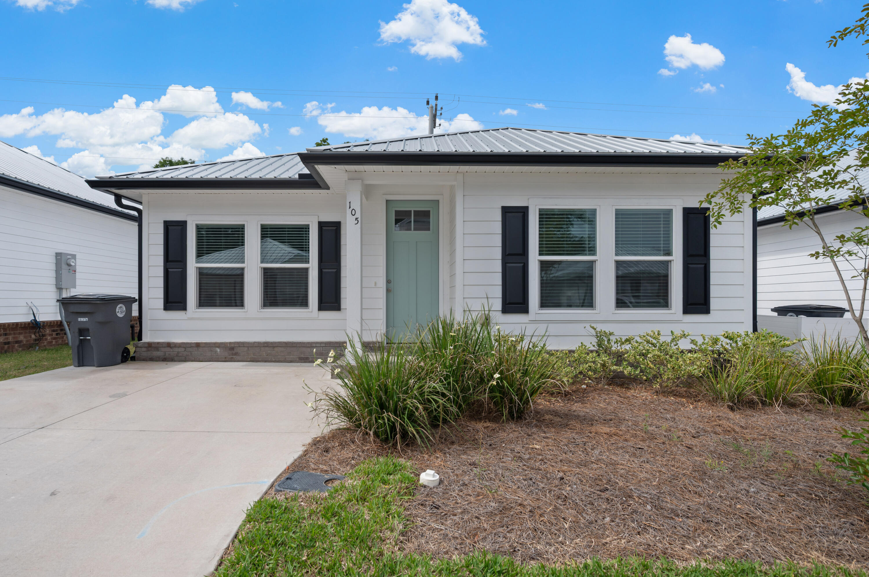 Welcome to the Cottages! This beautiful 2 bed 2 bath well maintained property combines modern style and everyday comfort. This property offers open living space and modern finishes throughout. Built in 2024, this property is designed with quartz countertops, stainless steel appliances, luxury vinyl plank, and a durable metal roof--all designed for low maintenance and long-lasting quality. 
This is a can't miss home!