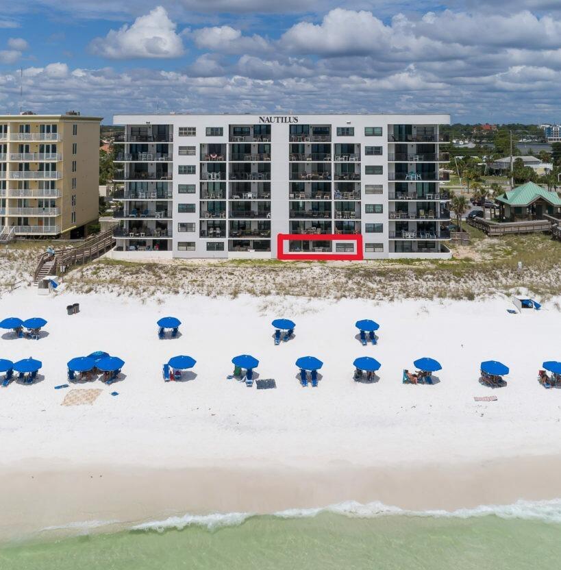 Motived Sellers! Amazing Gulf Views, Ground Floor Unit! This rare 3-bedroom unit offers stepless entry and is 100 feet to the beach. An oversized private balcony perfect for entertaining and relaxation, this spacious residence maximizes the coastal lifestyle experience. Positioned behind coastal dunes that provide natural wind and weather protection and offer privacy & tranquility. Convenient First Floor Location provides effortless access to beach, pool, grilling areas, & parking--no stairs or elevators required. Ideal as primary residence, vacation retreat, or rental property with documented strong rental performance and positive guest feedback.

Three Bedroom, spacious open floor plan with tile flooring throughout, fully updated kitchen with granite coun stainless steel appliances, and elegant coastal glass mosaic backsplash.
Update include new washer and dryer, newer stainless steel kitchen appliances, two newer HVAC units, hurricane-impact windows and sliding doors and updated living room furniture, mattresses, and TVs all contributing to a turnkey experience.
The spacious primary suite offers direct balcony access, an ensuite bath, and abundant natural light. Additional highlights include a second refrigerator in the laundry room for added convenience.
Don't miss your chance to own one of the most desirable floor plans in this beachfront complex.
All information and room dimensions deemed reliable. Buyer to verify all information.