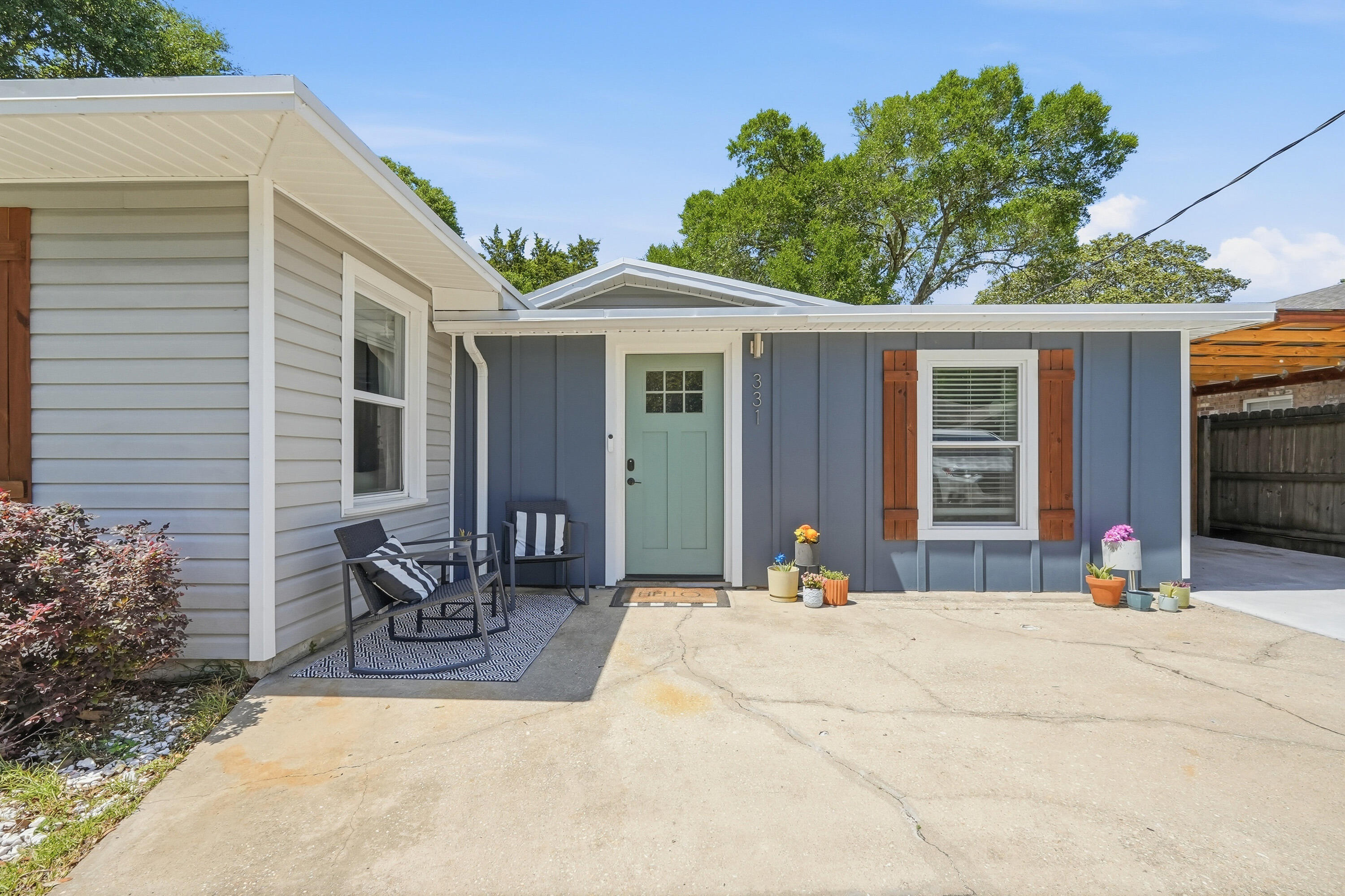 Now offering $10,000 towards buyer's closing costs or a rate buy down, this home is nestled in the highly sought-after Elliott Point neighborhood. With 4 bedrooms this beauty blends timeless character with thoughtful modern updates, offering the perfect mix of comfort, style, and outdoor living! Thoughtfully renovated throughout, recent upgrades include a stunning kitchen island with quartz countertops, newly upgraded kitchen sink, added walk-in pantry, new exterior door leading to the backyard, expanded primary walk-in closet, renovated guest bathroom, custom electric fireplace with built-ins, mudroom with storage bench, and more.

Step outside and fall in love with the incredible backyard designed for year-round entertaining and relaxation. Enjoy the spacious pergola with outdoor TV and cover that can remain with the home, along with artificial turf, a large concrete pad, basketball hoop, and plenty of space to gather, play, or unwind.

Conveniently located just a short walk, golf cart ride, or drive to neighborhood waterfront access, Ferry Park, and all the shopping, dining, and entertainment of Downtown Fort Walton Beach, this move-in ready home truly has it all. Schedule your private showing today!