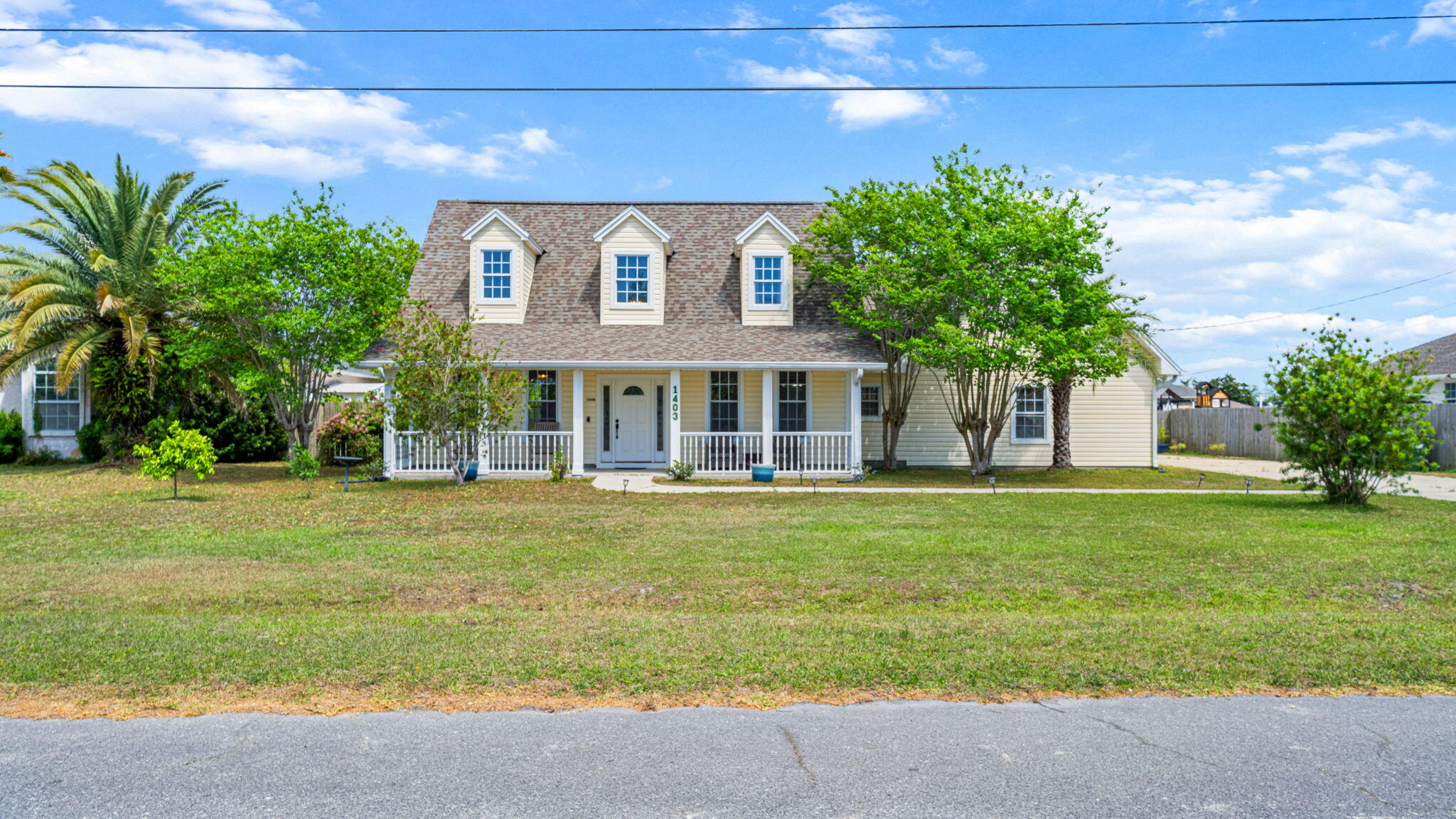 Located in a top-rated school district and tucked away on a quiet cul-de-sac in the heart of Lynn Haven, this spacious five-bedroom, two-and-a-half-bath home is designed for connection, comfort, and effortless living.

Soaring ceilings and an open, airy layout create an inviting first impression, while the first-floor primary suite offers both privacy and convenience. The main living area flows seamlessly into the kitchen and dining space--perfect for everyday living and entertaining alike.

Thoughtful upgrades and improvements throughout provide both value and peace of mind. The home features a Culligan reverse osmosis water filtration system with softener (2024), a brand-new water heater (2026), and a whole-home surge protector. The kitchen is equipped with a newer refrigerator and stove (2022), along with a microwave (2024), while updated lighting, including an overhead kitchen fixture (2015) adds warmth and functionality.

Additional enhancements include a replaced HVAC system (2019), updated front and rear doors (2018), a new garage door opener, and a garage motion security light (2024). An oversized two-and-a-half-car garage and expansive driveway ensure ample room for parking and storage. For outdoor enjoyment, a 2023 grill conveys with the sale--perfect for hosting and relaxing at home.

Upstairs, four additional bedrooms and a full bath offer incredible flexibility, ideal for guests, a home office, or growing households.

Situated in a golf-cart-friendly neighborhood with NO HOA, this home is just minutes from a local sports complex, bay access, nature preserves, and everyday conveniences. With new commercial development and Publix nearby, convenience meets lifestyle in one of Florida's most desirable communities.

Lynn Haven continues to stand out as one of the Top 10 Best Places to Live in Florida, offering a perfect blend of community charm, coastal proximity, and lasting value.
