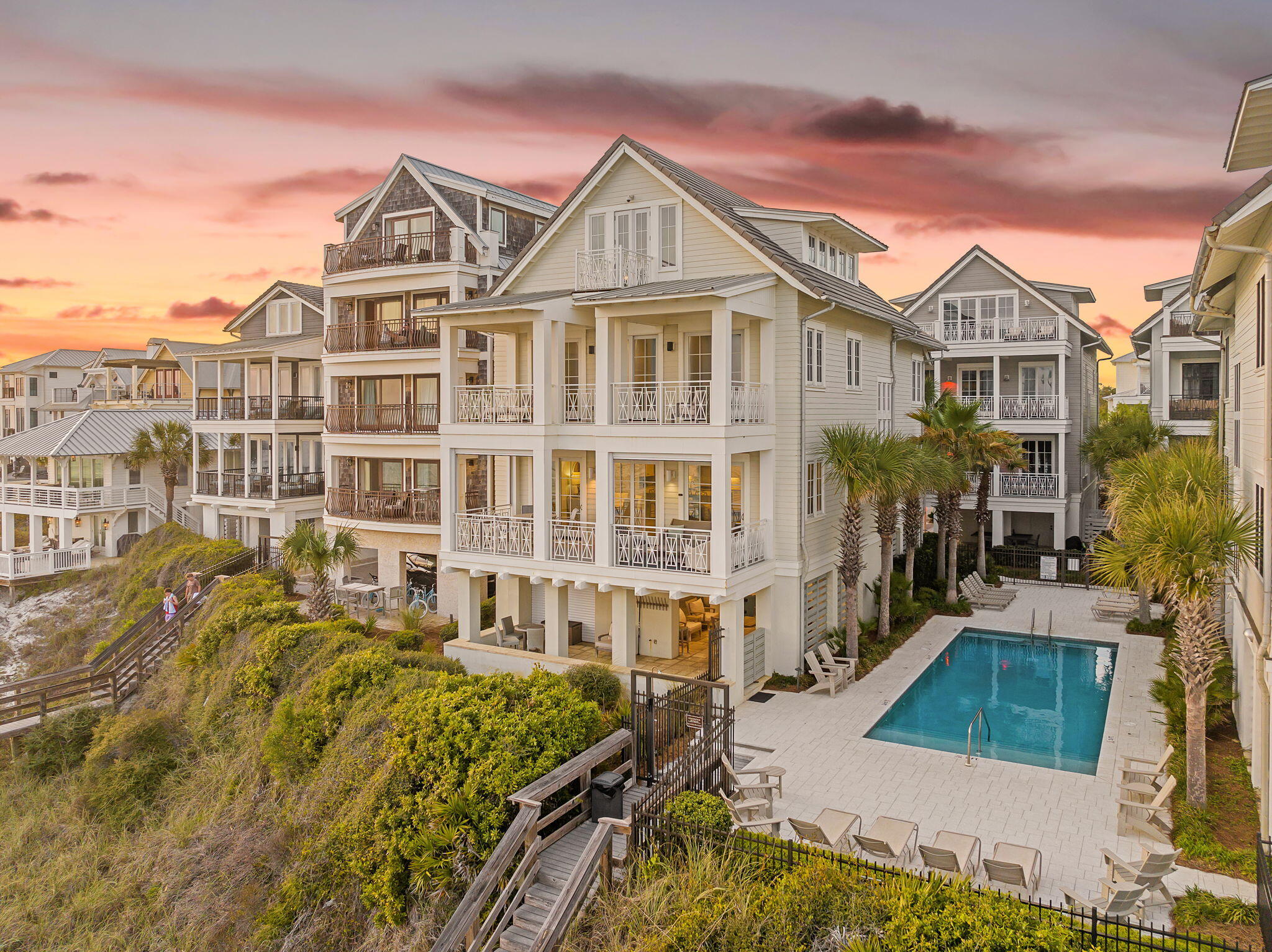 Welcome to 250 Winston Lane, a Gulf-front offering within the Bluffs of Inlet Beach, where privacy, scale, and uninterrupted coastal views define the experience. Set along one of the widest and most coveted stretches of shoreline on 30A, the property captures a rare sense of openness, with the Gulf extending outward in a way that feels both expansive and unobstructed. From nearly every primary living space, the Gulf becomes the focal point. Expansive windows and outdoor living areas are oriented to take full advantage of the views, where the horizon remains constant and ever-present. As the day winds down, the home transforms into a front-row setting for sunsets that define this stretch of the Emerald Coast, with shifting color reflected across the water in a way that is both striking and calm.

The residence itself is designed for effortless coastal living. Six bedrooms are thoughtfully arranged to accommodate both family and guests, while the main living areas flow naturally for gathering, entertaining, and extended stays. Just beyond the home, the community's Gulf-front pool sits directly adjacent, allowing for a seamless transition from private residence to poolside to beach within moments.

Ample parking supports both everyday living and larger gatherings, an essential feature for a home of this scale. And while the setting feels quiet and removed, you remain just minutes from the walkable energy of Rosemary Beach, with its collection of dining, retail, and coastal architecture.

250 Winston Lane is ultimately about perspective; wide Gulf views, extraordinary sunsets, and a level of privacy that is increasingly rare along 30A. It is a property that delivers both presence and experience, in a location that continues to define the upper tier of the market.
