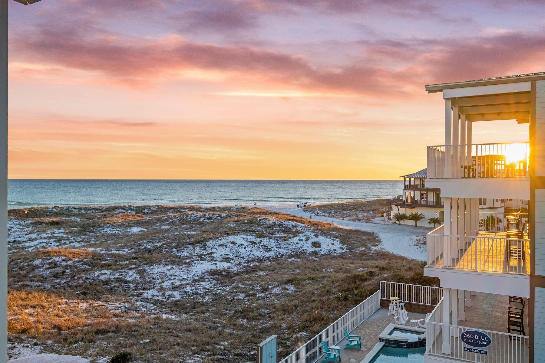 Ideally positioned just steps from the sugar white sand, this exceptional residence captures the character of historic Grayton Beach and offers expansive gulf views from all four stories. The main living level is designed for effortless entertaining, featuring a spacious open floor plan anchored by a custom chef's kitchen with bespoke cabinetry, premium KitchenAid appliances, dual ovens, dual dishwashers, two sinks, a six-burner gas cooktop with a pot filler, an ice maker, a beverage cooler, and an expansive island seating area. The living and dining areas are generously scaled, highlighted by custom furnishings, a large dining space ideal for gatherings, and seamless access to a private outdoor living area. Outdoors, a private saltwater plunge pool is complemented by an outdoor kitchen with a gas grill, sink, and ample counter space, along with an outdoor shower, creating a relaxed yet elevated coastal retreat. Multiple guest suites span the upper levels, offering privacy, comfort, and flexibility for family and guests. Several bedrooms feature private ensuite baths and direct access to gulf-view balconies, creating serene personal retreats throughout the home. With a private elevator connecting all three levels, the home offers effortless access for every generation and is fully ADA compliant for added convenience. The upper-level cocktail lounge is a standout feature, offering unobstructed gulf views and a fully appointed entertaining space with a beverage cooler, ice maker, and sink, ideal for sunset gatherings. The top floor further includes a dedicated workspace, a spacious bunk room, a full bath, and an additional living space, offering room for everyone to spread out and unwind. Thoughtfully designed and meticulously appointed, this Grayton Beach property presents a rare opportunity to own a truly distinctive residence in an iconic location, where coastal elegance and everyday livability meet.  Walton County Appraiser recognizes the Effective Built Date as 2021