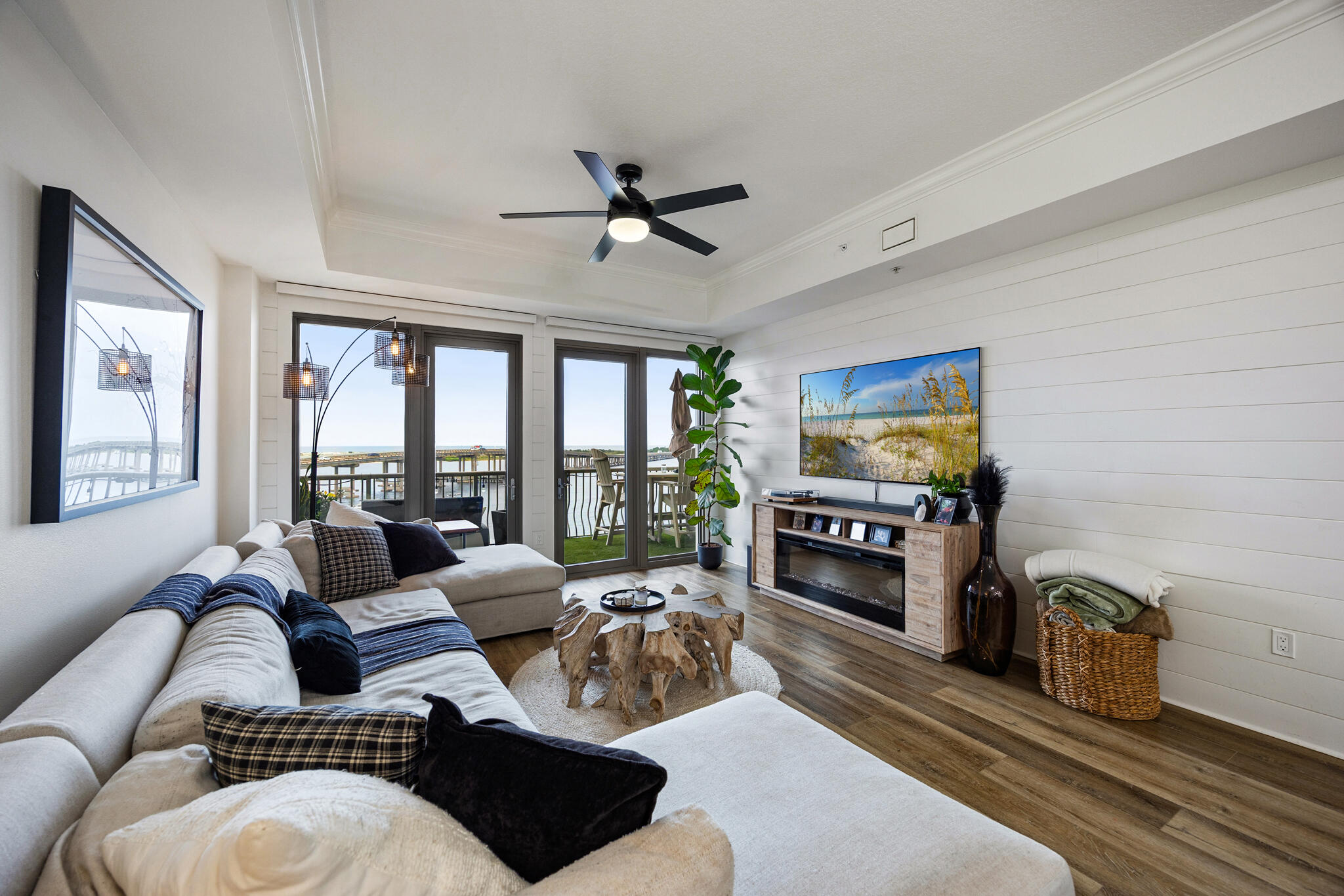 Location, location, location!!  Welcome to Sides Moreno Point, an exclusive waterfront community, located at the base of the Destin Bridge overlooking the emerald waters of East Pass and Crab Island. This beautifully renovated 3 bed/3 bath residence offers a spacious open floor plan complemented by a large balcony with breathtaking water views, making it the perfect primary residence, second home, or investment property. Boaters will appreciate the included, protected 40' boat slip with quick access to the Gulf.  Extensively Renovated in 2024, featuring a Shiplap accent wall from the entry into the living room; LVP flooring throughout the living area, hallway, and kitchen; new carpet in all bedrooms and new tile throughout the bathrooms; and a luxurious primary bath with a redesigned layout, custom cabinetry, oversized walk-in rain shower, and bidet toilet.  The kitchen has been completely remodeled to include custom cabinetry; a large center island with abundant storage; stainless steel appliances; built-in drawer microwave and a Farmhouse sink plus additional bar sink.  (See the complete Renovation List in the Document Section).  Additional features include custom wood closet shelving and a convenient storage unit located on the same floor.  This exceptional waterfront residence combines luxury, location, and an unbeatable boating lifestyle. Don't miss this rare opportunity to own one of Destin's premier waterfront properties.