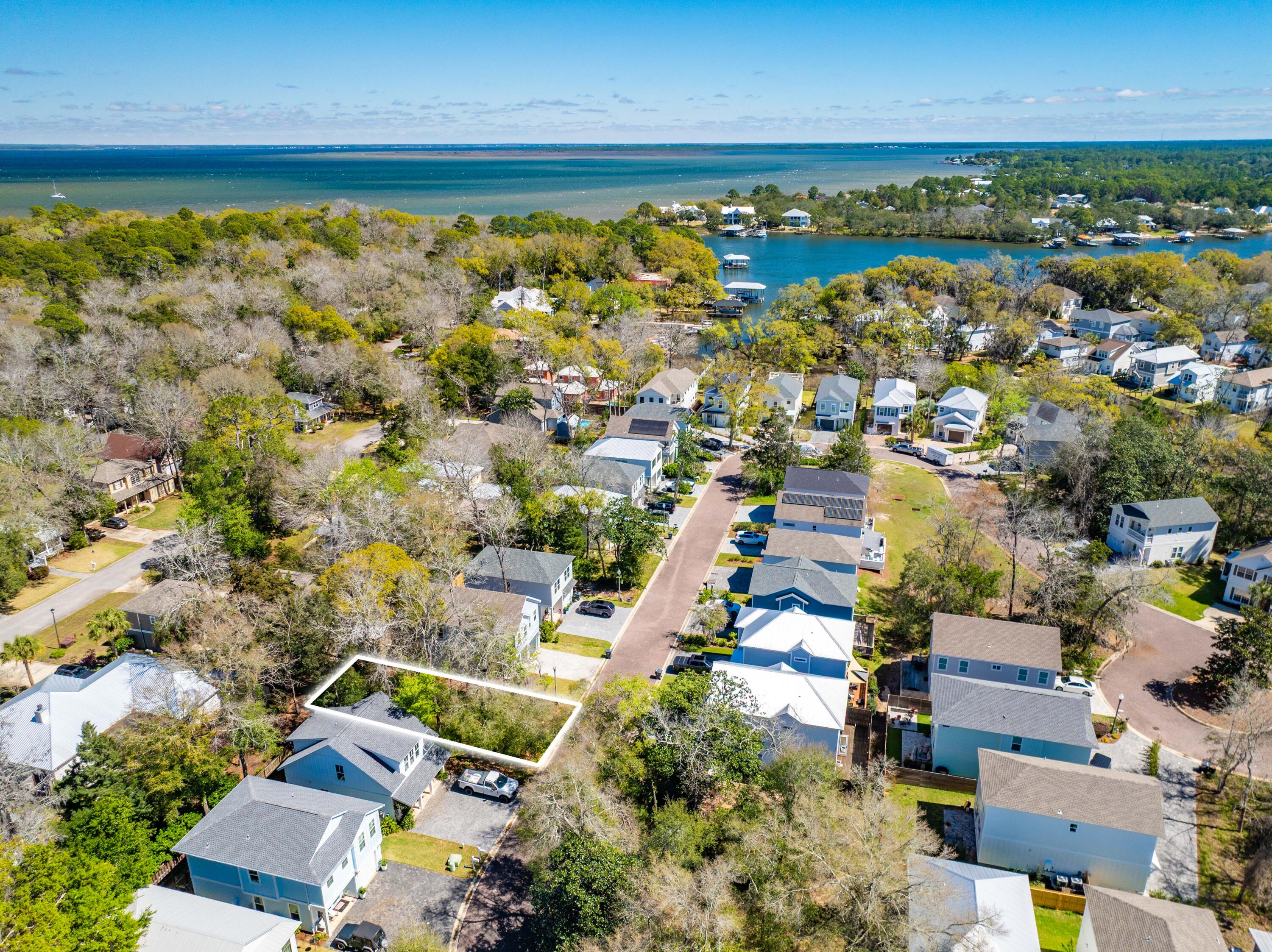 Build your dream home in Sacred Oaks, a hidden gem in South Walton with only a limited number of homesites remaining. This .07-acre exterior lot is ideally located behind Ascension Sacred Heart Hospital and just minutes from Grand Boulevard and Sandestin. Surrounded by mature landscaping and established homes, the property offers a private yet convenient setting. Enjoy low HOA fees and quick access to Choctawhatchee Bay for boating and coastal recreation. Perfect for new construction, this homesite places you near 30A beaches, dining, and shopping while offering a peaceful retreat in a highly desirable location.