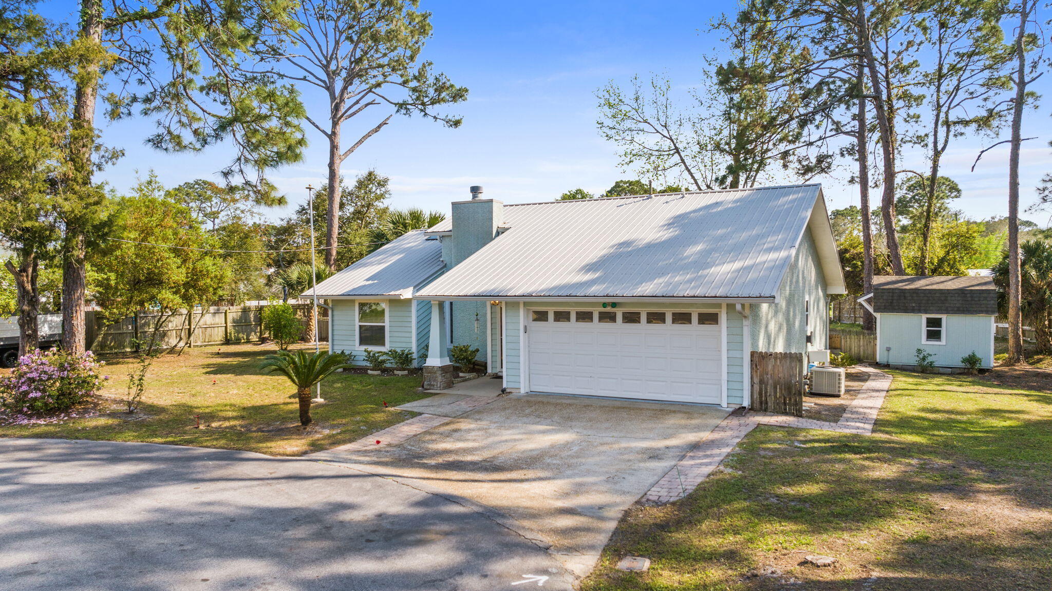 Your fully renovated Beach retreat awaits! *** This stunning cul-de-sac home has been completely transformed with no expense spared. This 3 bedroom + a heated/cooled bonus detached 4th bedroom/office or playroom offers a blend of coastal charm with brand-new flooring throughout, Quarts countertops, stylish backsplash, and all-new fixtures giving a fresh, upscale feel. Attention to detail is evident in every room, featuring a gorgeous new fireplace, updated doors, trim, and crown moulding that elevate the entire space. *** Whether a primary residence, relaxing second home, or a smart investment opportunity, this one checks every box. Move-in-ready and high-end finishes, it's perfectly suited for use as an income-producing rental as well. *** Schedule a tour today! This one won't last long!