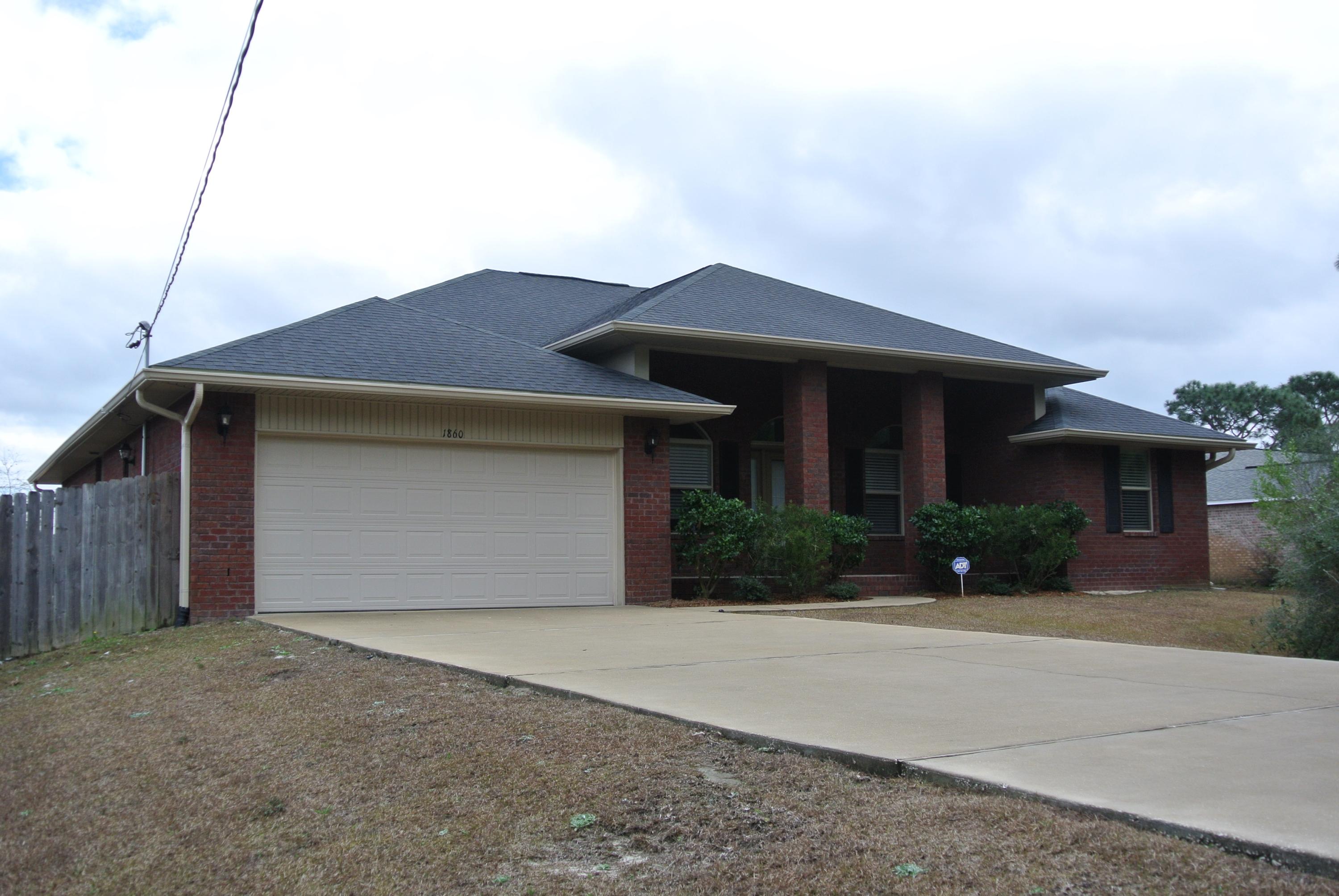 CHECK OUT THE VIRTUAL TOUR!! BACK ON THE MARKET!!! Welcome to 1860 Cardinal Lane beautiful four bedroom two bath all brick home. Features include formal dining room, office, ceiling fans, granite counter tops. Vaulted ceilings, large covered porch off family room and master suite. Kitchen boast stainless appliances including smooth top stove, step-up granite breakfast bar, double sinks. Master bedroom has entrance to covered porch, double vanities, garden tub, and stand alone shower. Home has new carpeting and paint Sherwin Williams agreeable grey throughout. Wood fenced back yard .50 acre lot with privacy buffer in front. Military easy access to highway 98, Holley by the Sea recreation center and white powder beaches.