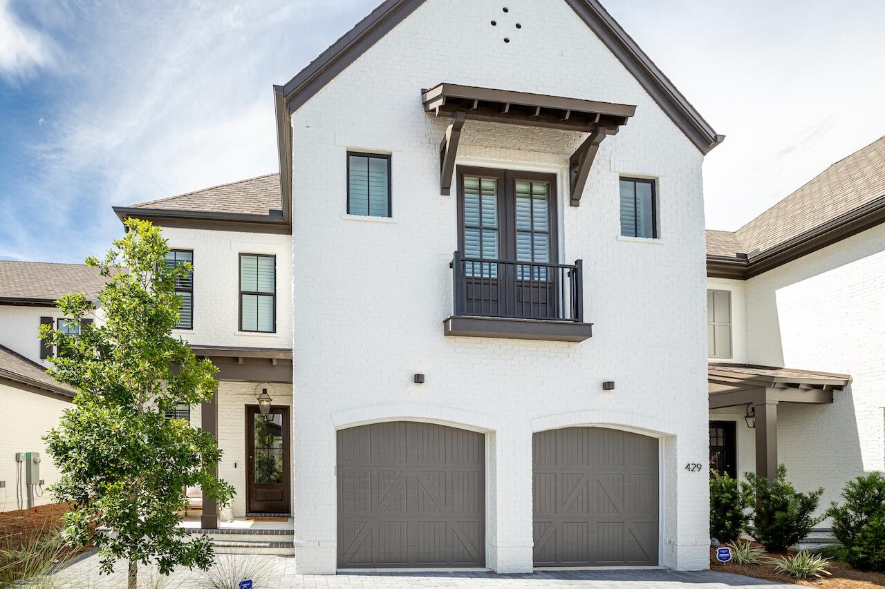 Discover an extraordinary retreat in the exclusive gated enclave of Ridgewalk on 30A, where refined coastal living meets the unhurried elegance of Scenic Highway 30A.  Just minutes from the Gulf's iconic sugar-white sands, this stunning Normandy floor plans offers 3 bedrooms, 3 baths, and 2,356 square feet of meticulously curated living space, where every detail has been chosen for the discerning buyer.
Soaring hardwood floors, custom shiplap accents, and designer finishes create an atmosphere of sophisticated warmth throughout.  The chef's kitchen is a showpiece: premium appliances, natural gas cooking, a generous island, beverage refrigerator. and a walk-in pantry with floating shelves, designed for effortless entertaining and quiet evenings in.
A private pocket office offers the flexibility today's luxury buyer demands, while the main living living area flows seamlessly to a covered outdoor retreat complete with a built-in summer kitchen, your personal oasis for alfresco dining under the coastal sky.
Nestled near Santa Rosa Golf Club and Gulf Place, and protected by a no short term rental policy, Ridgewalk offers something rare on 30A: true community, genuine privacy and lasting value.
