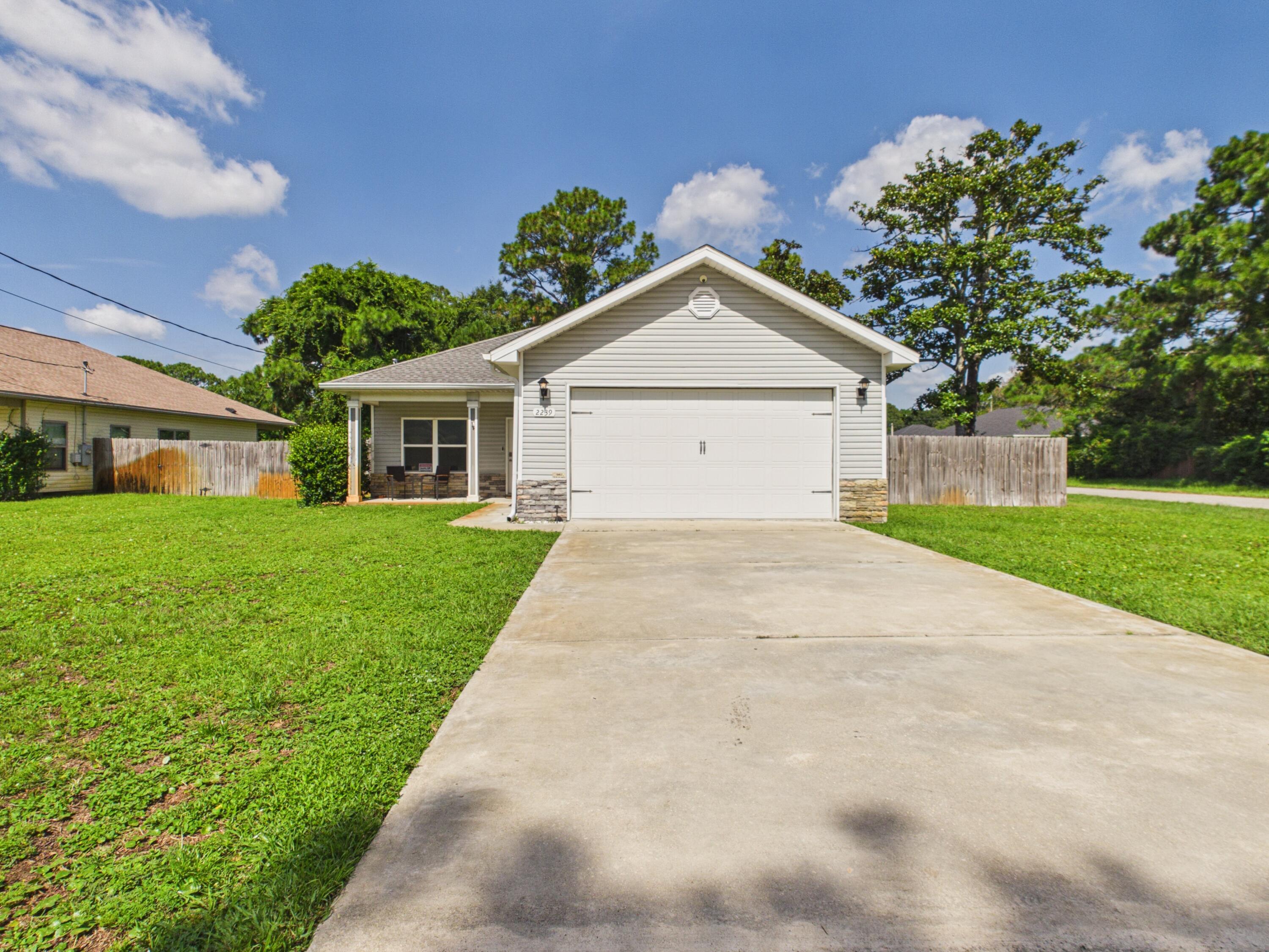 STUNNING 3-bedroom, 2-bath home situated on a desirable corner lot in a quiet, well-established neighborhood! Thoughtfully designed with both style and functionality in mind, this home features beautiful tile plank flooring, granite countertops, stainless steel appliances, a spacious walk-in pantry, an oversized laundry room, and generous closet space throughout. 

Outside, enjoy the covered back patio and the added convenience of a double gate with side street access to the backyard. Conveniently located just minutes from shopping, dining, top-rated schools, and the sugar-white sands of Navarre Beach, this home also offers an easy commute to Hurlburt Field and Eglin AFB.