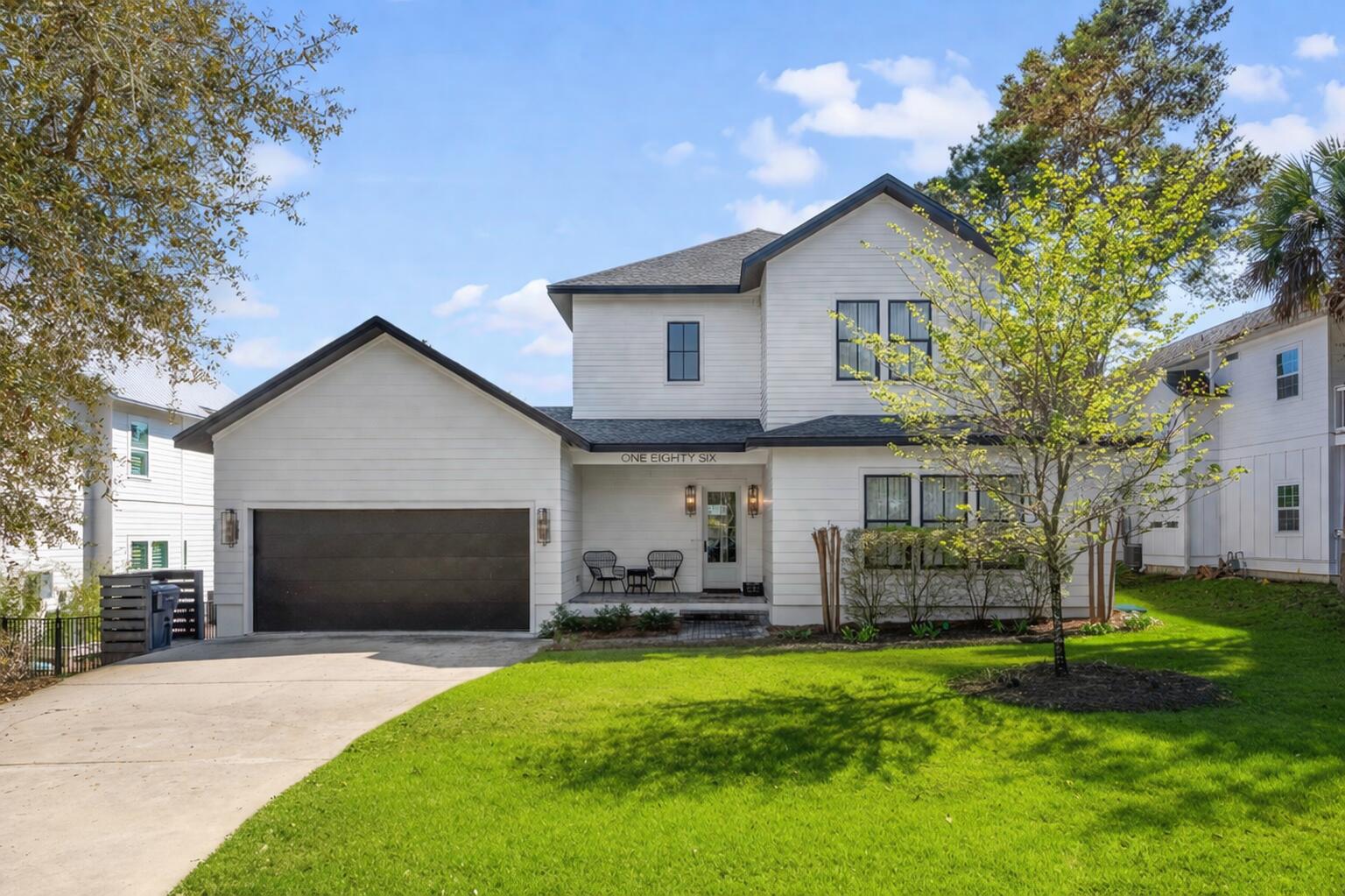Tucked away on a quiet dead-end street off 30A, this custom coastal retreat offers privacy, comfort, and a prime Santa Rosa Beach location. Built in 2020, this 4 bed, 4 bath home features an open concept living space with engineered hardwood floors, shiplap accents, gas fireplace, and a chef's kitchen with quartz countertops, custom cabinetry, island, and Thermador range. Step outside to a private backyard with a 20 ft pool, brick paver patio, and fenced yard, perfect for relaxing or entertaining. Designed for full time living or rental potential, the layout includes a main level bunk room and three upstairs en suite bedrooms, including a spacious primary suite. Located in Gulfview Heights with no HOA, just a short walk or bike ride to beach access, dining and shopping.