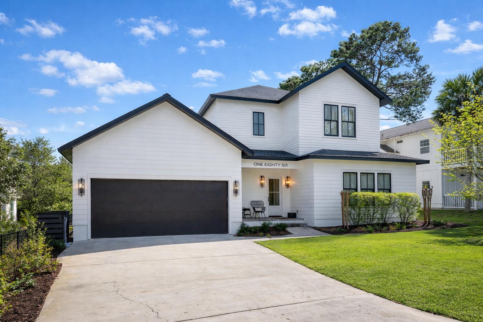 Tucked away on a quiet dead-end street off 30A, this custom coastal retreat offers privacy, comfort, and a prime Santa Rosa Beach location. Built in 2020, this 4 bed, 4 bath home features an open concept living space with engineered hardwood floors, shiplap accents, gas fireplace, and a chef's kitchen with quartz countertops, custom cabinetry, island, and Thermador range. Step outside to a private backyard with a 20 ft pool, brick paver patio, and fenced yard, perfect for relaxing or entertaining. Designed for full time living or rental potential, the layout includes a main level bunk room and three upstairs en suite bedrooms, including a spacious primary suite. Located in Gulfview Heights with no HOA, just a short walk or bike ride to beach access, dining and shopping.