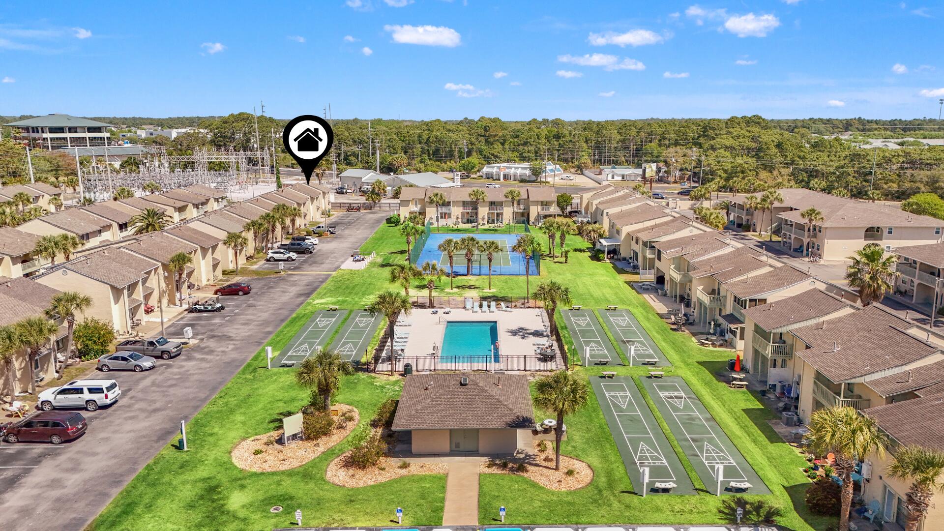 Beach Life, Rental Income Incredible Value, All in One! This is the beach townhome you've been waiting for! Fully furnished and rental-ready, all you need to bring is your suitcase and toothbrush. Located just a 6-minute walk to the beach or 2 min golf cart ride, this beautifully maintained unit offers unbeatable value and comfort. Enjoy your evenings on the extended tropical back patio or relax on the balcony, surrounded by 11 sparkling community pools and Florida nature. With 2 assigned parking spaces right at your door and additional golf cart parking, convenience meets coastal charm. Additional highlights: VA & FHA friendly, STR-friendly with strong projected GRI of $25k+($35k+ with some updates). Exceptionally cared for, this is a rare opportunity to own a move-in-ready beach retreat in one of Panama City Beach's most sought-after communities. You won't find a better deal at the beach! Call your agent TODAY! LOW HOA fees include: 11 pools(5 heated), pickleball, shuffleboards, water-front restaurant pool, mini golf, exercise room, tennis courts, playground, WIFI, pest control, termite bond, trash, ground keeping, property patrol, gated community and more.