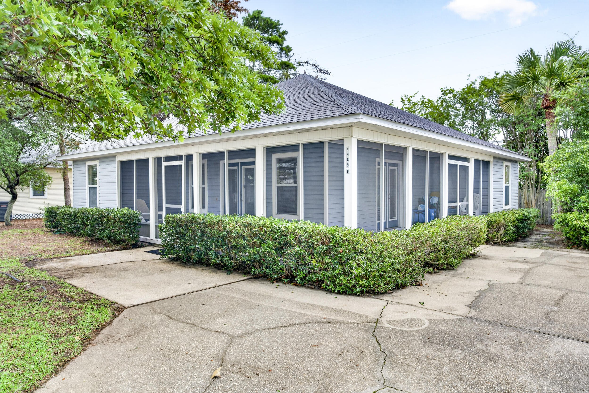 Priced to sell FAST - Lowest price home in Crystal Beach & No HOA! Drone Shots Coming Soon!  Nestled among mature trees in one of Destin's most sought-after beach communities, this 3BR/2BA home offers the perfect blend of privacy, charm, and coastal living. Just 0.3 miles from public beach access with restrooms, this short-term rental-capable property is ideal as a primary residence, second home, or investment opportunity. Enjoy the Old Florida feel from the spacious 343SF wraparound porch, relax on the private back deck with no rear neighbors, and take advantage of ample room to add a pool & create a private oasis on the west side of the home. Pending City of Destin approval, a 12X20 pool would be an amazing addition. The home features high ceilings, a split floorplan, large breakfast bar, newer systems, easy care tile, good size closets and is ready for your vision & decorating touch!  If you have been looking for a quaint home in the heart of Crystal Beach, you know it is RARE to find anything in this price point. Located in the desirable flood zone X so no flood insurance is required; all exterior doors have been updated with impact rated glass doors & back deck was rebuilt with Trex. Don't miss your chance to own a secluded beach retreat in the heart of Crystal Beach! The iconic Crystal Beach neighborhood on Scenic Hwy 98 has it all - quick access to Destin Commons, Publix, Henderson Spa, & Henderson Beach State Park. Crystal Beach is minutes to fabulous restaurants, the Scenic 98 bike path & all that Destin has to offer. Centrally located so quick drive to both Sandestin area attractions and the Harbor District. Full time City of Destin residents are eligible for free City parking passes, Joe's Bayou Boat Launch annual sticker & reduced Henderson Beach State Park annual pass. This property has SO much potential! Make your appointment to see this fabulous piece of paradise today. Buyer to verify all pertinent information and conduct their due diligence.