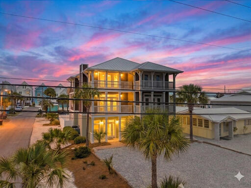 FINANCIAL POWERHOUSE! This prime beachside asset commands an Estimated Annual Gross Rental Revenue between $85,000 - $90,000. Designed for compounding returns, this revenue is projected to increase year-over-year. By capturing highly valuable repeat guests, you will maximize occupancy rates and secure a rapidly increasing ROI from day one. Full historical data (coming soon) and future projections are available upon request. This highly-rated VRBO property is in the top 10% of guest reviews for the area, with 139 reviews in total. LUXURY COASTAL LIVING MEETS A LEGACY OF MEMORIES. This isn't just a beach house; it is a ''Love-Held'' sanctuary where generations have gathered to discover the very best of Northwest Florida. From the quiet shores of Cape San Blas to the historic charm of Pensacola, this home has served as the ultimate home base for family reunions and life-changing adventures. The current owners' children are reluctant to let it go--and for good reason. It has been a magical learning environment where the kids grew up alongside the Gulf, learning the pride of homeownership and the joy of coastal stewardship. While the family is ready to move on to their next chapter, they leave behind a home filled with soul and a foundation built for a lifetime of new traditions. PRISTINE BEACHSIDE ELEGANCE JUST STEPS FROM THE SHORE. Located on the coveted beach side of Thomas Drive--just three lots off the emerald waters--this 2,934 (total sq. ft.) Tuscan-inspired residence  offers breathtaking Gulf views from the third level. The interior is a masterclass in luxury, featuring 10-foot ceilings on the first floor, granite countertops, and high-end stainless appliances. Designed to sleep 10, the layout includes three large bedrooms plus two built-in bunk areas, ensuring plenty of space for everyone to spread out. With four covered balconies, two electric fireplaces for ambience/light only, a jetted master tub, every detail has been curated for comfort and sophisticated beach living. YOUR PRIVATE OUTDOOR OASIS WITH UNMATCHED UTILITY. Step outside into your own private retreat featuring a gunite pool, recently upgraded with a new pump and filter (2022). This ''Twin Home'' attached single unit offers a rare advantage: a solid concrete divider wall that ensures absolute privacy and zero sound transfer between sides. Unlike most beach properties, parking is never an issue here. The expansive driveway accommodates up to 8 vehicles (4 side, 4 front), providing ample space to park your RV or boat right on the property--a true rarity so close to the Gulf. A TURN-KEY, COMPLETELY FURNISHED INVESTMENT. Whether you are seeking a premier primary residence or a high-performing vacation asset, this property is being sold fully furnished and ready to deliver from day one. The home features a brand-new downstairs water heater (2024), and a newer upstairs HVAC. Perfectly positioned in the quieter area of Panama City Beach, you are just a short drive from the world-class dining and shopping of 30A, Destin, Mexico Beach and Port St. Joe, while remaining tucked away in a peaceful, highly flexible coastal pocket.