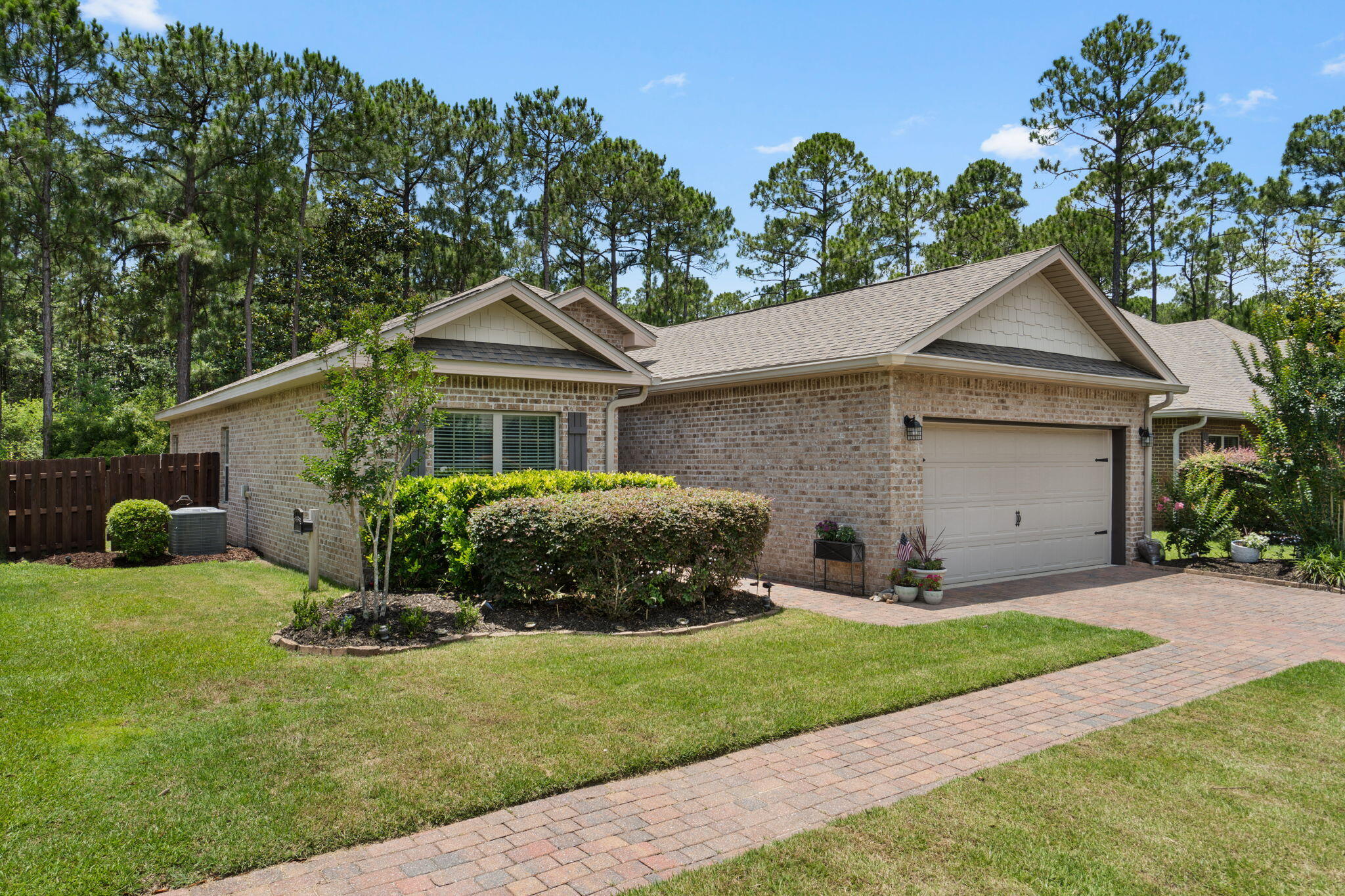 Now live featuring a BRAND NEW ROOF!

Welcome to 365 Cox Road, one of only a handful of true single-family homes currently available under $500,000 in North Santa Rosa Beach. Sold FULLY FURNISHED, this move-in ready home makes relocating or purchasing a Florida getaway effortless--simply bring your suitcase. Whether you're searching for a primary residence, second home, or long-term rental investment, this property is ready from day one.

Offering 4 bedrooms, 2 bathrooms, and 1,847 square feet, the home features a full brick exterior, paver driveway, and a freshly resodded front yard that create lasting curb appeal. Inside, the open-concept floor plan is complemented by luxury vinyl plank flooring throughout, providing a modern, low-maintenance living space.

The kitchen overlooks the main living area and includes a new refrigerator, new dishwasher, and a spacious pantry. A versatile flex room at the back of the home offers endless possibilities as a home office, media room, second living area, or playroom.

Step outside to a large deck overlooking a wooded buffer, creating a private setting to relax or entertain. The HVAC system has been professionally maintained with bi-annual servicing, and the brand-new roof adds even more value and peace of mind.

Located just ½ mile from North Eden Park and only 5 miles from Blue Mountain Beach and Scenic Highway 30A, you'll enjoy convenient access to the Emerald Coast's renowned beaches, dini