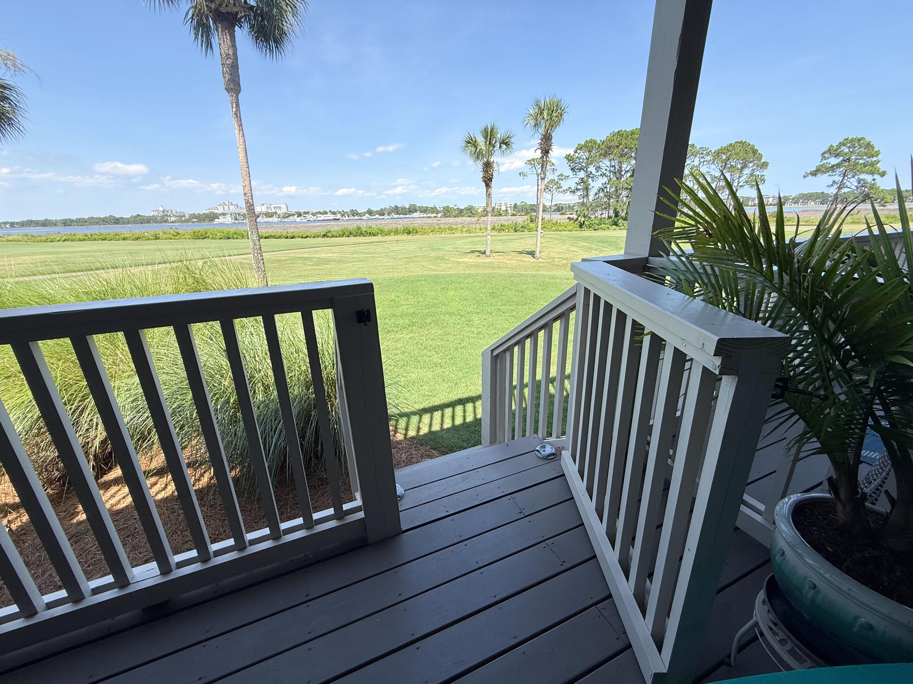 Some homes don't just offer a place to live--they offer a completely new way to experience the world. Nestled within the prestigious gates of the Sandestin Resort, this fully reimagined Harbour Point sanctuary is an invitation to slow down, breathe deeply, and immerse yourself in the extraordinary.  This unit offers million-dollar water and golf course views at half the price and with all the benefits!

Imagine a life where your morning coffee is paired with panoramic, unobstructed views of lush, golf greens meeting the sparkling, sun-kissed waters of the Choctawhatchee Bay.

Literally step off your large deck to the green and walking path by the Bay.  Perfect for taking a stroll or walking a beloved pet.  

Thanks to an intentional open-concept design and floor-to-ceiling sliding glass doors, the line between breathtaking nature and modern luxury is beautifully blurred.

Whether you are crafting a gourmet meal, dining with loved ones, or unwinding in the living room, the vibrant colors of the coast serve as your living backdrop.  

Take a dip in the community pool and enjoy bay living at its finest.  

Step onto your private patio to claim your front-row seat to the spectacular fireworks and drone displays dancing over The Village of Baytowne Wharf where shopping, dining, grocery and convenience are a short golf cart drive away.  A golf cart comes with this stunning condo.  The Village offers regular events such as Wine Festival, Tacos and Tequilla, and the Kentucky Derby Party to name just a few.  

Extensively and elegantly renovated, this first-floor haven perfectly balances coastal charm with contemporary sophistication. Featuring premium new appliances, sleek modern flooring, and refined interior finishes, every detail has been curated to offer a seamless lock-and-leave lifestyle. Because it sits on the ground level, your connection to the landscape is immediate, effortless, and endlessly inviting.

This property isn't just a retreat for the soul; it is a powerful engine for your financial future. Offering highly lucrative short-term rental capabilities.  

It is that rare, perfect intersection of a dreamy personal getaway and a high-performing asset.

When you live here, the world-class amenities of Sandestin Resort become an extension of your own backyard, championship golf courses and professional tennis and pickle ball facilities, enjoy your private access to the pure white sugar sand and crystal-clear water of the Emerald Coast, world-class marina just steps away, boutique shopping, fine dining, and endless coastal nature trails.

Opportunities to own a piece of paradise this perfectly aligned with luxury and opportunity are rare.

Call or text today to schedule your private showing, step through the front door, and feel what it means to truly be home.

Unit has newer hvac and hot water heater.  

All information and measurements are deemed accurate but should be verified by the buyer.