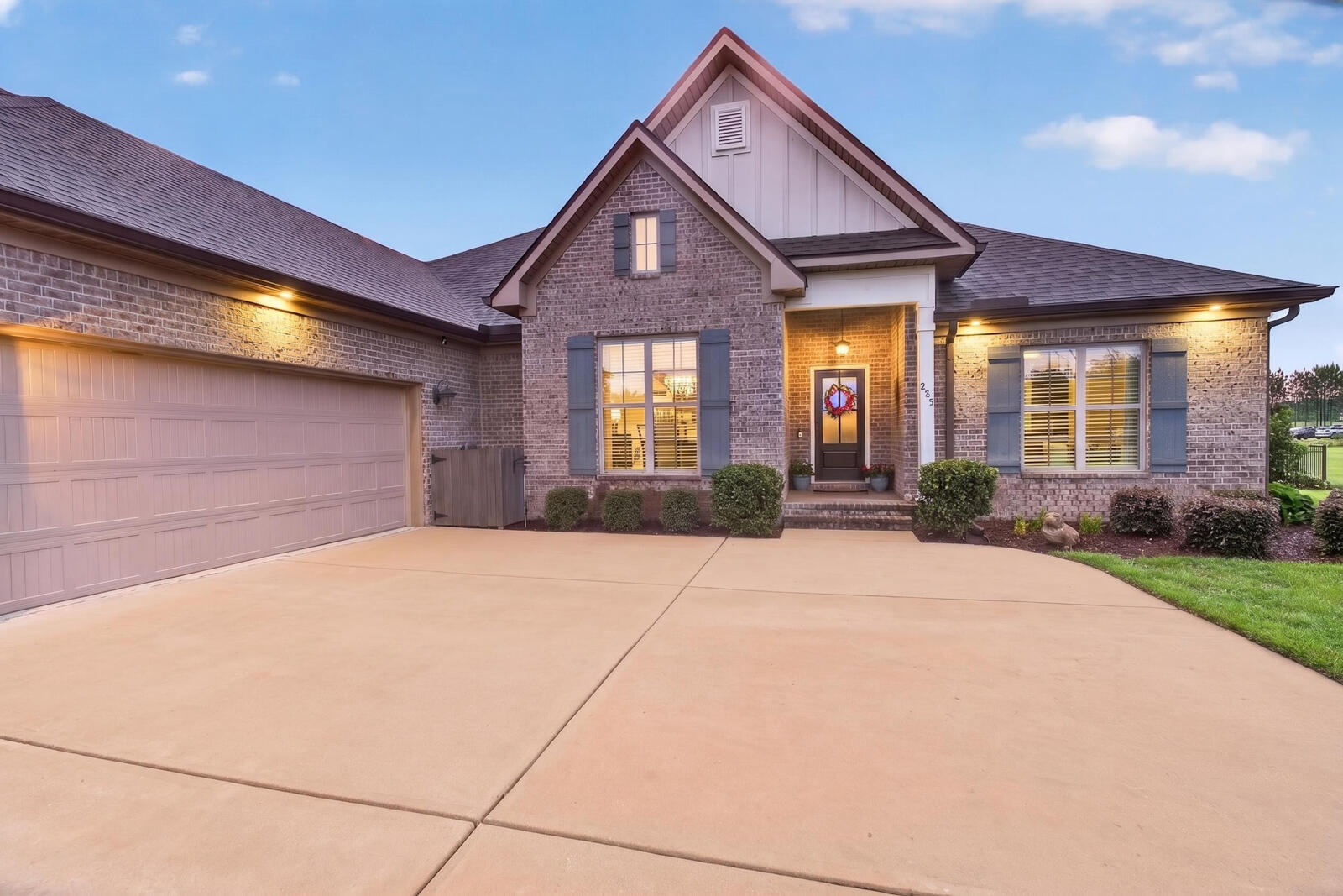 Welcome to easy, resort-style living in this beautifully maintained 4-bed, 3-bath brick home located in the desirable gated golf community of Windswept Estates!
 This home features an open-concept with an inviting foyer, a generous layout with crown molding, engineered hardwoods throughout the entire home, and a cozy custom-built fireplace anchoring the main living area. This floor plan flows seamlessly for entertaining, with a layout that connects the living, dining and kitchen.  
A well appointed kitchen with an abundant of cabinetry, granite countertops, bar seating, spacious island, large pantryand a built in banquet allows for extra seating. Stainless steel applianceand an over the stove pot filler. Primary retreat includes a cozy sitting area,  separate walk-in closets, dual vanities,  tiled shower, and a soaking tub to enjoy at the end of the day!
Step into an outdoor oasis featuring a custom-built screened porch completed with ceramic tile flooring, great for entertaining or just relaxing in the evenings. A landscaped back yard which includes a garden and complete fencing. Several upgrades throughout this home reflect the workmanship and charm.  
 Community perks include relaxing  amenities including  community pools, a clubhouse, tennis / pickleball courts, and a playground.  Neighborhood celebrations throughout the year! Upgrades through the home:
Gutters all sides
Built in fireplace with mantel
Soffit lights on timers
Built in banquette with storage in kitchen
Ceiling fans
Upgraded lighting fixtures
Hardwood floors in all rooms
Additional landscaping including new fence
Paver patio and raised garden boxes with pavers
Reverse osmosis installed under kitchen sink
Coffered ceiling in primary bedroom
Backsplash in kitchen
Work bench in garage
Added shelving in pantry
Cabinets installed in laundry room
Pot filler in kitchen over stove
Garbage disposal
Soft close hardware added on all cabinets
Screened back porch and porcelain floor tile 
Garbage bin area fenced in
Smarthome technology