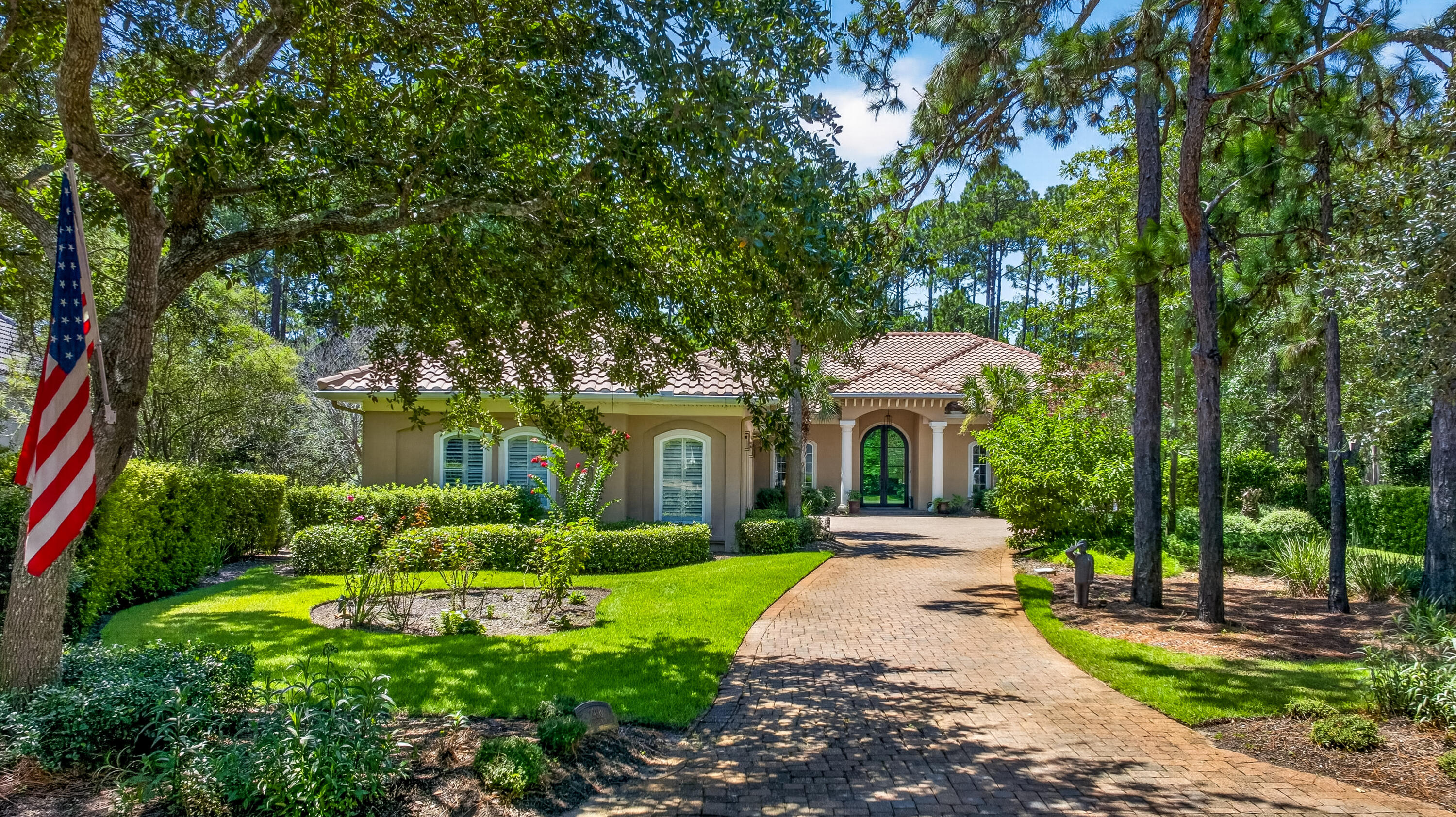 Nestled near the end of a quiet street in the prestigious Pine Valley neighborhood, this exceptional 5-bedroom, 6-bath estate offers 4,475 square feet of impeccably designed living space where timeless elegance meets resort-style Florida living. From the moment you arrive, the impressive paver courtyard, stately columns, and grand entry create an unforgettable first impression. Inside, soaring ceilings, abundant natural light, custom architectural details, and new engineered hardwood flooring complemented by elegant tile throughout create a warm yet sophisticated atmosphere. Designed with both everyday living and grand entertaining in mind, the expansive open floor plan seamlessly connects the formal living room with its striking stone fireplace, elegant dining room, spacious family room, and an extraordinary chef's kitchen. The heart of the home is a culinary masterpiece, thoughtfully appointed with premium Wolf appliances, including a professional gas range and oven, Wolf microwave, Miele built-in coffee system, Sub-Zero wine cooler, and an abundance of custom cabinetry with beautiful glass display cabinets. Granite countertops, an oversized center island, generous prep space, and a walk-in pantry highlighted by antique French doors complete this stunning space, making it equally suited for intimate family dinners or lavish entertaining. The luxury continues outdoors, where nearly every room opens to an incredible screened tropical retreat designed to rival a five-star resort. With almost as much outdoor living space as the home's interior, this spectacular oasis centers around a sparkling pool and spa surrounded by lush tropical landscaping. The expansive outdoor living room features a fireplace for cool evenings and an impressive outdoor kitchen equipped with a Viking grill, refrigerator, microwave, ice maker, extensive granite prep space, and seating for twelve or more. Whether hosting unforgettable gatherings or enjoying quiet evenings under the stars, this outdoor sanctuary offers year-round enjoyment.

The thoughtfully designed floor plan includes two expansive primary suites, each with private access to the pool and outdoor living area. One luxurious owner's retreat features separate his-and-her walk-in closets and a beautifully updated spa-inspired bathroom designed for ultimate relaxation.

Two additional guest suites each feature private en-suite baths, while a dedicated office provides the perfect work-from-home environment.

Perfect for multigenerational living or extended guests, the attached private apartment adjacent to the garage offers complete independence with its own fully equipped kitchen, living and dining area, walk-in closet, full bath, and washer and dryer--ideal for visitors, in-laws, or a live-in nanny.

Additional recent improvements include two new water heaters, ensuring modern efficiency and peace of mind.

Completing this remarkable property is a spacious three-car garage with dedicated golf cart storage, offering plenty of room for vehicles, recreational equipment, and all the essentials for enjoying the Florida lifestyle.

Perfectly balancing luxury, comfort, and functionality, this extraordinary Pine Valley residence offers an unparalleled living experience where every detail has been carefully curated. From the exquisite chef's kitchen and elegant interiors to the spectacular resort-style outdoor living spaces, this is a home designed to impress and built to be enjoyed.

As an introduction to the Sandestin lifestyle, we invite our new owners to explore amenities that make Sandestin special. The listing brokerage and seller(s) are presenting the buyer(s) of this property with (2) 90-minute rounds of Tennis court time, a golf foursome at one of our three championship courses, and a round of golf for up to four (4) players at the unrivaled Burnt Pine Golf Club.

Sandestin Golf and Beach Resort features more than seven miles of beaches and pristine bay front, four championship golf courses, 15 world-class tennis courts, a 226-slip marina, a fitness center, spa and celebrity chef dining. Shop, dine and play at the charming pedestrian village, The Village of Baytowne Wharf and more. Inside the gates of the resort, residents enjoy a balanced lifestyle of high-class living, spanning the 2,400 acres from the beach to the bay. Everything within the gates of the resort is accessible by golf cart or bicycle. The entire resort is interconnected by miles of pedestrian, bike and golf cart paths that weave through groves of live oaks, meandering past natural lagoons, fountains, man-made lakes, and meticulously landscaped fairways.