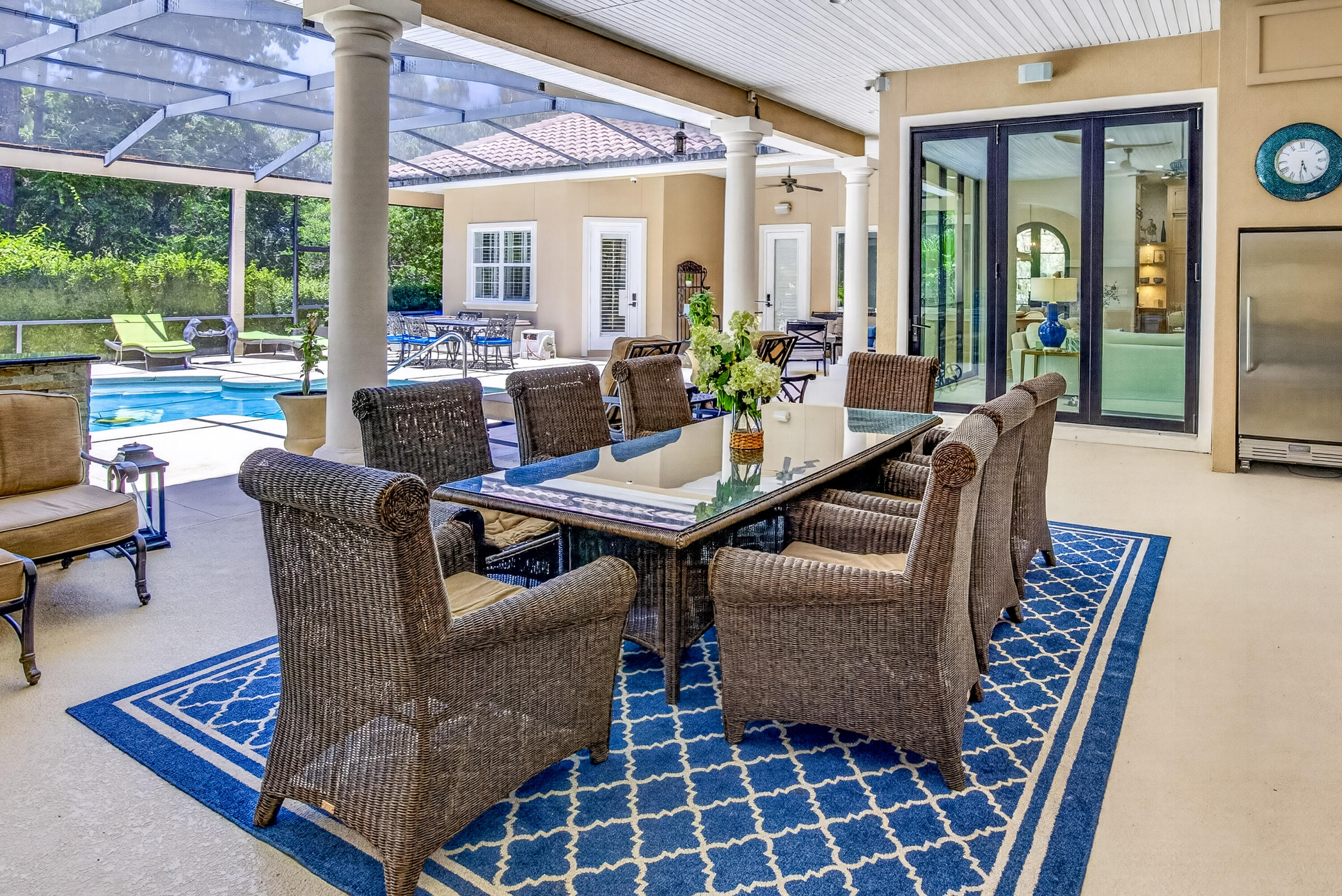 Nestled near the end of a quiet street in the prestigious Pine Valley neighborhood, this exceptional 5-bedroom, 6-bath estate offers 4,475 square feet of impeccably designed living space where timeless elegance meets resort-style Florida living. From the moment you arrive, the impressive paver courtyard, stately columns, and grand entry create an unforgettable first impression. Inside, soaring ceilings, abundant natural light, custom architectural details, and new engineered hardwood flooring complemented by elegant tile throughout create a warm yet sophisticated atmosphere. Designed with both everyday living and grand entertaining in mind, the expansive open floor plan seamlessly connects the formal living room with its striking stone fireplace, elegant dining room, spacious family room, and an extraordinary chef's kitchen. The heart of the home is a culinary masterpiece, thoughtfully appointed with premium Wolf appliances, including a professional gas range and oven, Wolf microwave, Miele built-in coffee system, Sub-Zero wine cooler, and an abundance of custom cabinetry with beautiful glass display cabinets. Granite countertops, an oversized center island, generous prep space, and a walk-in pantry highlighted by antique French doors complete this stunning space, making it equally suited for intimate family dinners or lavish entertaining. The luxury continues outdoors, where nearly every room opens to an incredible screened tropical retreat designed to rival a five-star resort. With almost as much outdoor living space as the home's interior, this spectacular oasis centers around a sparkling pool and spa surrounded by lush tropical landscaping. The expansive outdoor living room features a fireplace for cool evenings and an impressive outdoor kitchen equipped with a Viking grill, refrigerator, microwave, ice maker, extensive granite prep space, and seating for twelve or more. Whether hosting unforgettable gatherings or enjoying quiet evenings under the stars, this outdoor sanctuary offers year-round enjoyment.

The thoughtfully designed floor plan includes two expansive primary suites, each with private access to the pool and outdoor living area. One luxurious owner's retreat features separate his-and-her walk-in closets and a beautifully updated spa-inspired bathroom designed for ultimate relaxation.

Two additional guest suites each feature private en-suite baths, while a dedicated office provides the perfect work-from-home environment.

Perfect for multigenerational living or extended guests, the attached private apartment adjacent to the garage offers complete independence with its own fully equipped kitchen, living and dining area, walk-in closet, full bath, and washer and dryer--ideal for visitors, in-laws, or a live-in nanny.

Additional recent improvements include two new water heaters, ensuring modern efficiency and peace of mind.

Completing this remarkable property is a spacious three-car garage with dedicated golf cart storage, offering plenty of room for vehicles, recreational equipment, and all the essentials for enjoying the Florida lifestyle.

Perfectly balancing luxury, comfort, and functionality, this extraordinary Pine Valley residence offers an unparalleled living experience where every detail has been carefully curated. From the exquisite chef's kitchen and elegant interiors to the spectacular resort-style outdoor living spaces, this is a home designed to impress and built to be enjoyed.

As an introduction to the Sandestin lifestyle, we invite our new owners to explore amenities that make Sandestin special. The listing brokerage and seller(s) are presenting the buyer(s) of this property with (2) 90-minute rounds of Tennis court time, a golf foursome at one of our three championship courses, and a round of golf for up to four (4) players at the unrivaled Burnt Pine Golf Club.

Sandestin Golf and Beach Resort features more than seven miles of beaches and pristine bay front, four championship golf courses, 15 world-class tennis courts, a 226-slip marina, a fitness center, spa and celebrity chef dining. Shop, dine and play at the charming pedestrian village, The Village of Baytowne Wharf and more. Inside the gates of the resort, residents enjoy a balanced lifestyle of high-class living, spanning the 2,400 acres from the beach to the bay. Everything within the gates of the resort is accessible by golf cart or bicycle. The entire resort is interconnected by miles of pedestrian, bike and golf cart paths that weave through groves of live oaks, meandering past natural lagoons, fountains, man-made lakes, and meticulously landscaped fairways.