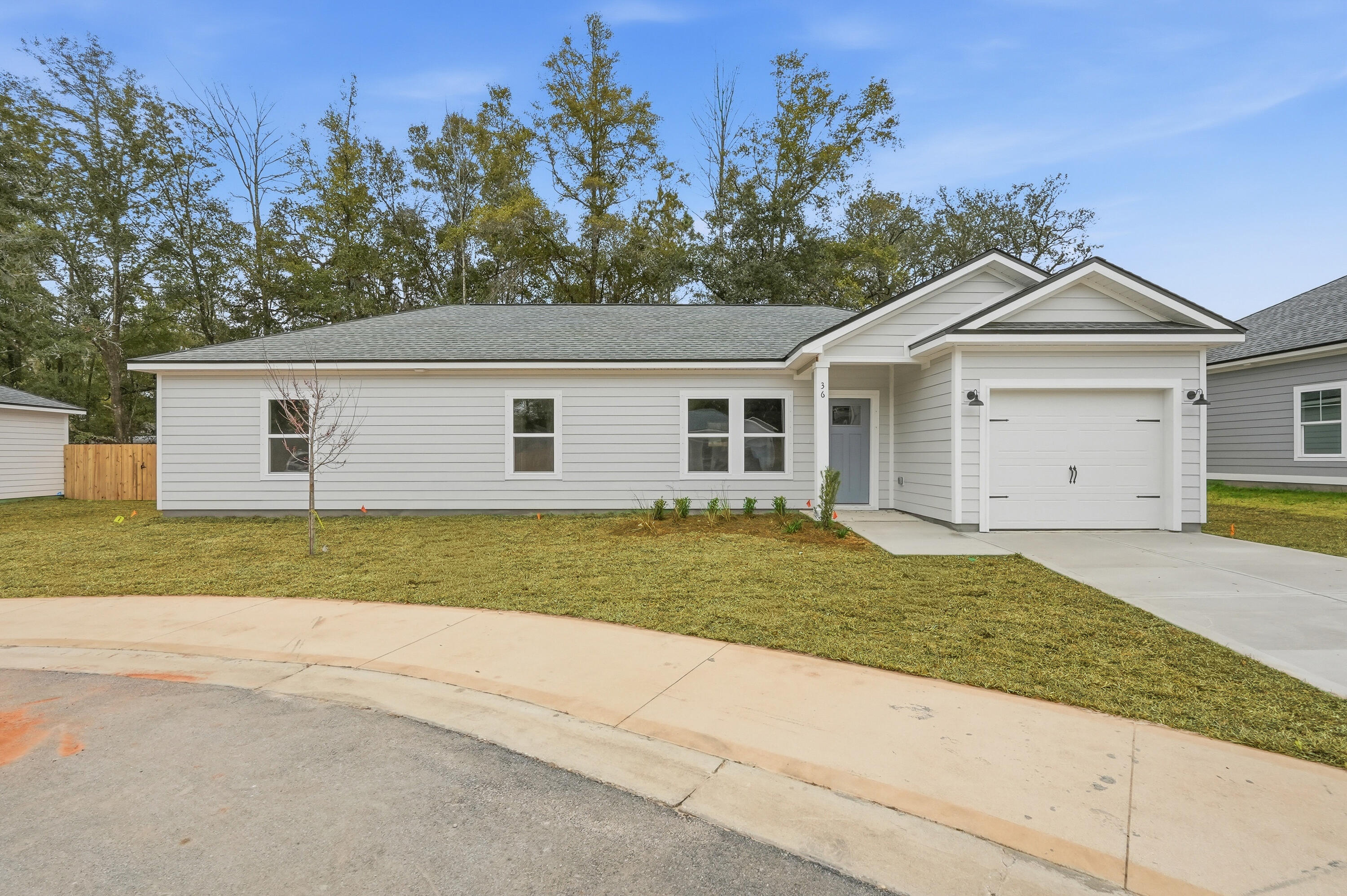 $15,000 TOWARDS BUYER CLOSING COSTS + FREE REFRIGERATOR/WASHER/DRYER/BLINDS  MUST CLOSE BY JUNE 10, 2026 - THAT'S A SWEET DEAL FOR THIS cozy cottage - ALL HARDI CONSTRUCTION - Open family/kitchen with dining nook. Raised ceilings, luxury vinyl plank flooring, work island, pantry, white shaker cabinets, quartz countertops.  Large mud room/laundry area.  Owner's suite has walk-in closet. Privacy fenced & landscaped with sprinkler system (HOA provides lawn mowing).