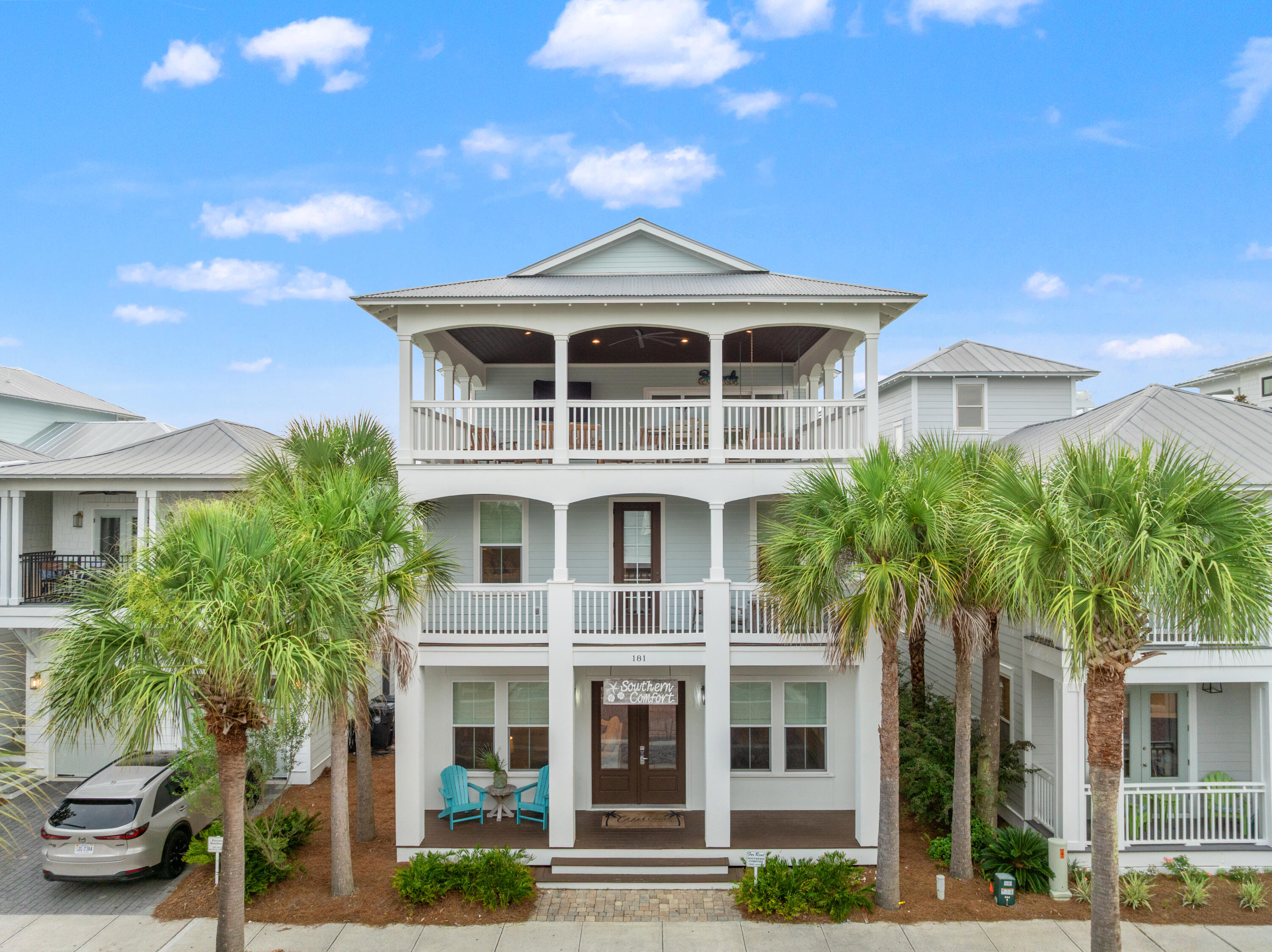 ''Southern Comfort'' is a 5-bedroom home with a carriage house in Seacrest Beach, offering over 3,100 square feet and accommodations for up to 18 guests. Located on the east end of Scenic 30A between Rosemary Beach and Alys Beach, the property is a short walk or tram ride to the beach and just steps from Seacrest's 12,000-square-foot community pool.
The main level features an open living, dining, and kitchen area with hardwood floors, marble countertops, a large island, stainless steel appliances, plus a guest bedroom and full bath. Upstairs are two king suites, a bunk room that sleeps four, and the primary suite with a walk-in closet, double vanity, tiled shower, and private balcony. The third floor includes a bonus room with a sleeper sofa, full bath, kitchenette, and access to a large rooftop deck.
The carriage house includes a king bedroom, full bath, open kitchen, living area with a sleeper sofa, and separate entrance, providing additional space for guests or rental flexibility.
Additional features include a two-car garage with storage, an outdoor shower, gas grill, and the home is being sold fully furnished, making it ready for personal use or rental income. Conveniently located near restaurants, shopping, and entertainment along 30A, with Northwest Florida Beaches International Airport approximately 21 miles away.
New window treatments are scheduled to be installed within the next 3-4 weeks.