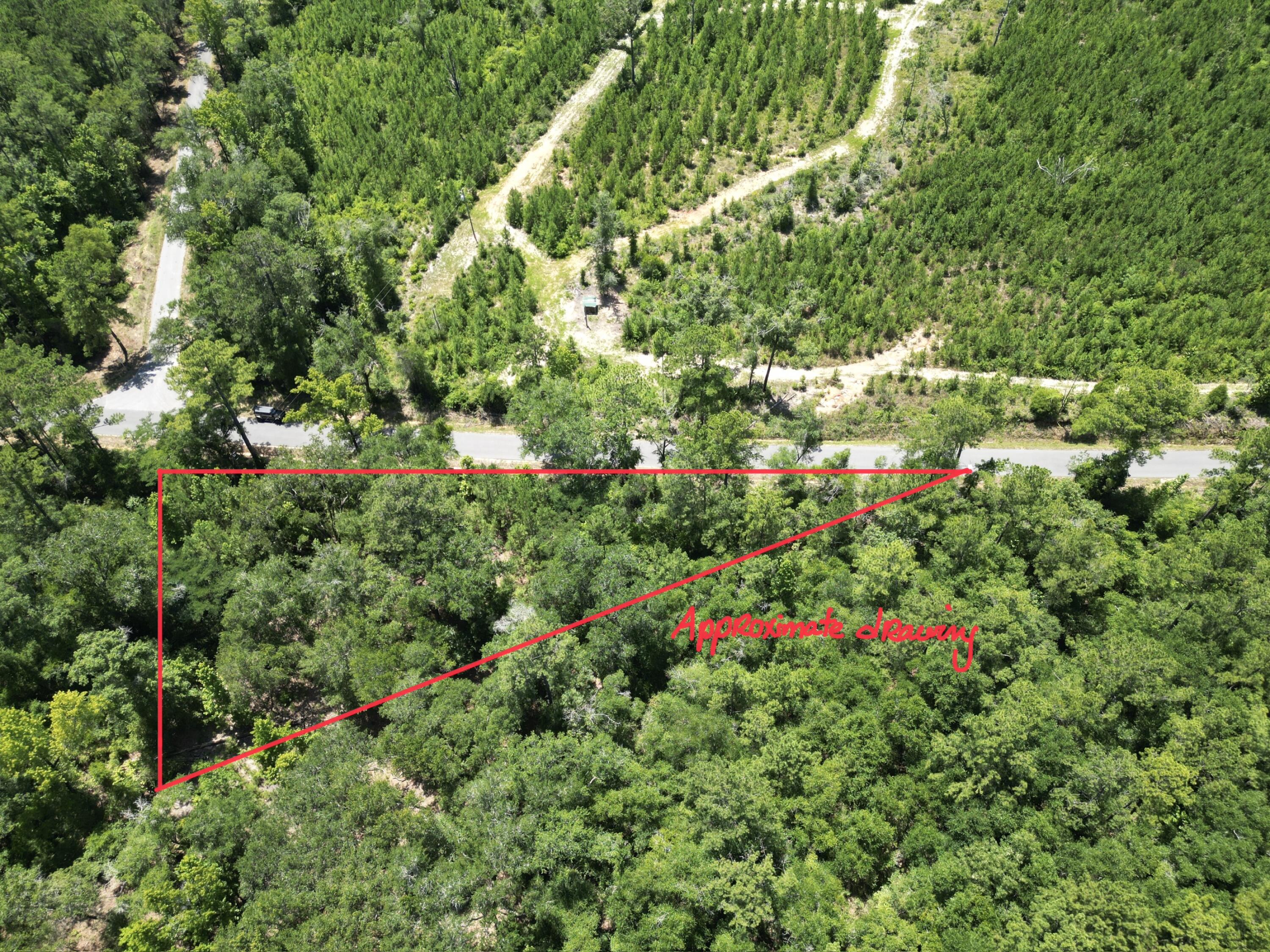 Build Your Dream Home or Bring Your New Manufactured Home to This Ready-to-Go Homesite! This 0.43-acre property offers the perfect blend of peaceful country living with the convenience of nearby amenities. Located in Flood Zone X, flood insurance is generally not required by lenders, providing added peace of mind. A  2 bed 2 bath 12' x 52' manufactured home previously occupied the property, and the existing well and septic remain on site. Their condition is unknown and they are being conveyed as-is, offering potential value for the new owner. Enjoy the tranquility of a rural setting while being less than 5 minutes from shopping, restaurants, schools, medical facilities, and the Interstate 10 entrance, making daily commuting a breeze. You're also approximately 40 minutes from the sugar-white sandy beaches of Florida's Emerald Coast, where you can enjoy boating, fishing, dining, and year-round recreation.

The property is conveniently located near St. Joseph Park and a local church, adding to the appeal of this quiet community. Whether you're looking to build a site-built home or place a new manufactured home, this property offers an excellent opportunity in a desirable location.
See photos for information PER the county GIS map