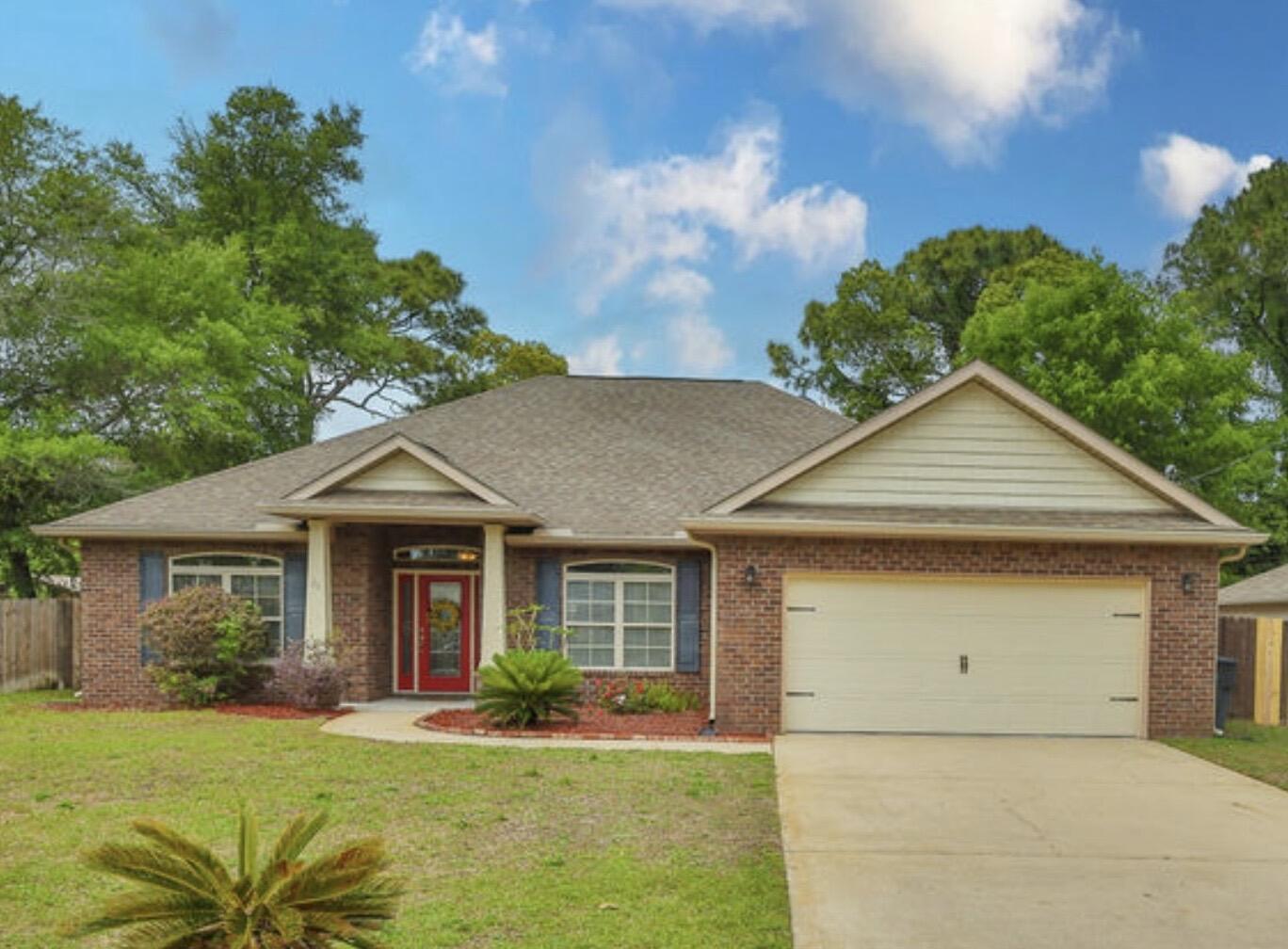 Welcome to a beautifully maintained all-brick home offering space, comfort, and an ideal central location just minutes to both AFB's, beaches, shopping, worships centers, & schools. Built in 2011 by a Parade of Homes-winning builder, this 4 bed, 2bath home offers over 2,000 square feet of well-designed living space w/a layout that flows ideal for both everyday living & entertaining, creating a seamless connection between living, dining, and kitchen spaces.
Inside you'll find a spacious living area w/crown molding, LVP flooring, & natural light throughout, creating a warm and inviting atmosphere. The kitchen features granite countertops, stainless appliances, a large pantry, & a raised breakfast bar perfect for gathering w/friends, breakfast w/the kids, or help with homework while you cook, all while staying connected to the main living areas. The split floor plan offers a private primary suite w/tray ceiling, garden tub, separate shower, double vanity, & a generous walk-in closet, providing a comfortable retreat at the end of the day, while the additional bedrooms offer flexibility for guests, office space, or hobbies.
Outside, enjoy a fully fenced backyard, w/luscious green grass, & space for a pool, offering plenty of room for outdoor activities and entertaining. The screened in patio is ideal for hosting friends, relaxing w/a good book & your morning coffee, or family dinners, extending your living space outdoors year-round. Situated on a generous lot with a sprinkler system, this home offers the perfect combination of quality construction, thoughtful updates, and everyday functionality, and this home has continued to be well cared for and is ready for its next owner, making it a strong option for those seeking comfort, space, and a convenient Fort Walton Beach location.