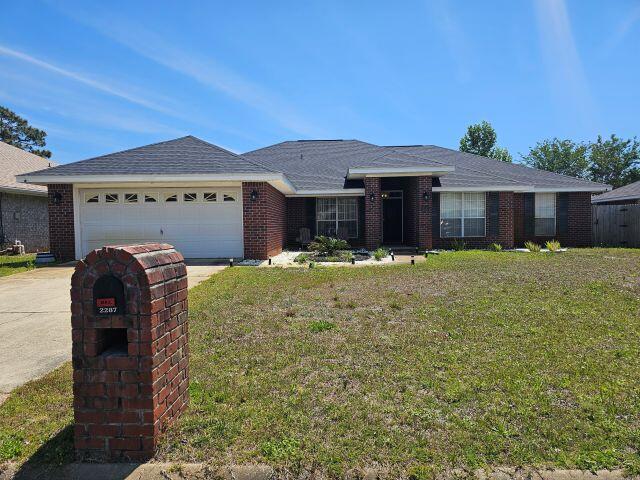 AVAILABLE 06/25/2026- Welcome to 2287 Heritage Circle a beautifully renovated, all-brick home designed for comfortable coastal living. With 4 spacious bedrooms, 2 full bathrooms, and a smart split floor plan, this property offers the perfect blend of privacy and togetherness. Step inside to discover cathedral ceilings, gorgeous granite countertops, modern finishes, and inviting plant ledges throughout the open living spaces. Enjoy meals in the formal dining room or the sunny eat-in kitchen area. The versatile bonus room provides  an ideal space for a home office or gym, catering to your lifestyle needs. The living room, complete with a cozy fireplace, sets the scene for memorable gatherings. Step out back to your covered patio and unwind by the firepit perfect for cool coastal evenings. The fenced yard sits on a manageable .18-acre lot, making outdoor enjoyment effortless. Additional features include an attached 2-car garage for ample parking and storage. Located just minutes from Hurlburt Field AFB and the sugar-white sands of Navarre Beach, this home offers unmatched convenience for both work and play. 2287 Heritage Circle is your gateway to the Gulf Coast lifestyle. Don't miss this exceptional opportunity! Schedule your tour today!