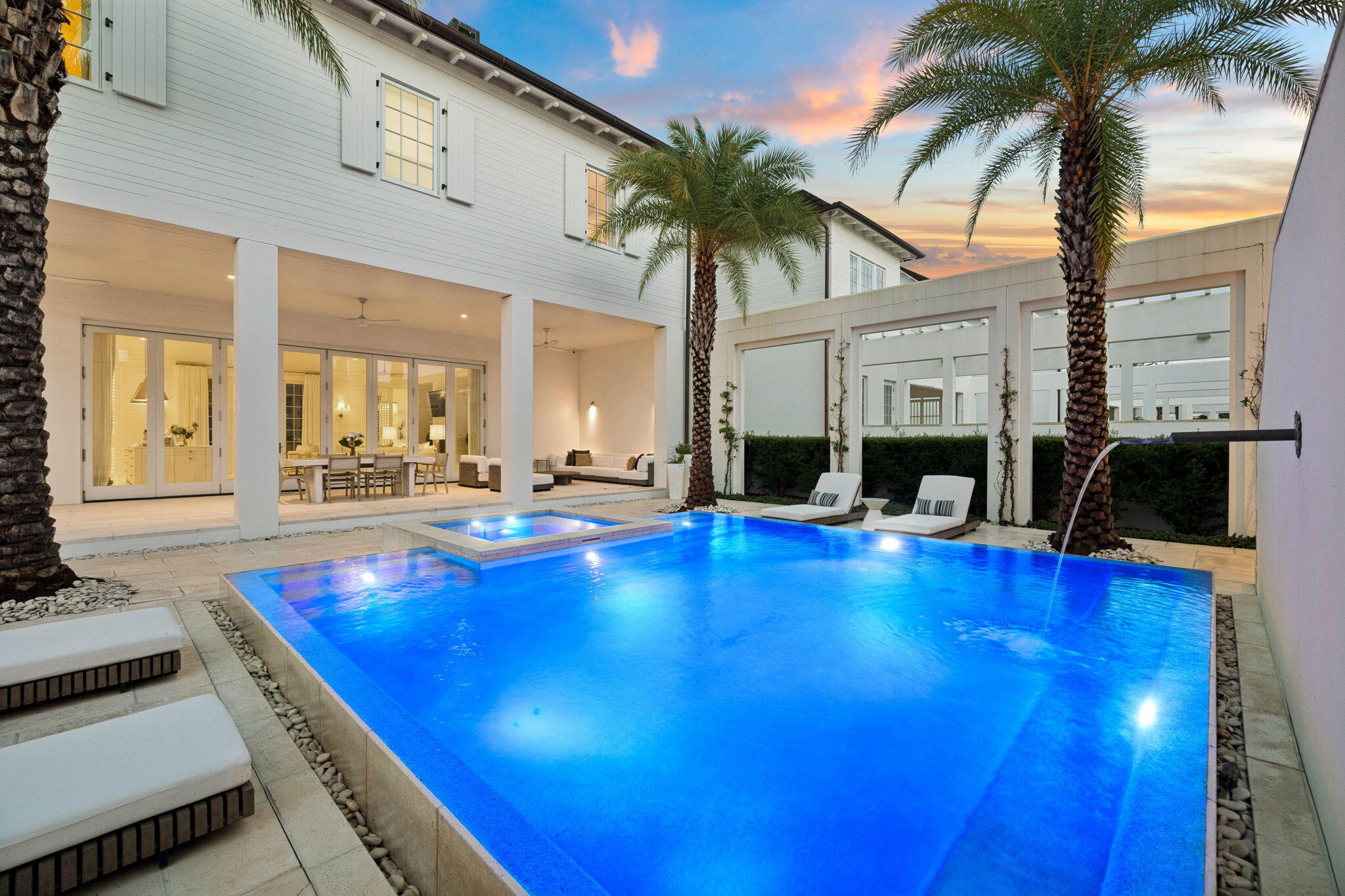 Introducing the Villa Anamaya!  With the masterful Khoury/Vogt Architectural design, this home is designed around the art of gathering!  This extraordinary five-bedroom, five-and-a-half-bath residence invites a life defined by effortless luxury and quiet coastal elegance.

At its center, a private courtyard with an expansive  heated pool and spa becomes your own secluded oasis. Spend mornings beside the saltwater pool and spa, afternoons preparing fresh coastal fare in the outdoor summer kitchen, and evenings entertaining beneath the stars in beautifully appointed loggia and dining spaces. 

Inside, timeless materials and exceptional craftsmanship create an atmosphere of understated sophistication. Large-format concrete pavers anchor the main living areas, while warm white oak flooring extends throughout the upper level. The gourmet kitchen is equal parts beautiful and functional, featuring Waterworks fixtures, Emtek hardware, a scullery that would delight your inner chef, and a curated suite of Sub-Zero and Wolf appliances.

A beautifully appointed private carriage house provides exceptional flexibility, offering a luxurious guest suite, private home office, fitness studio, or secluded retreat for extended family and friends while enhancing the home's privacy and functionality.

Perfectly positioned within Kaiya Beach Resort, this exceptional estate offers the tranquility of a private sanctuary
