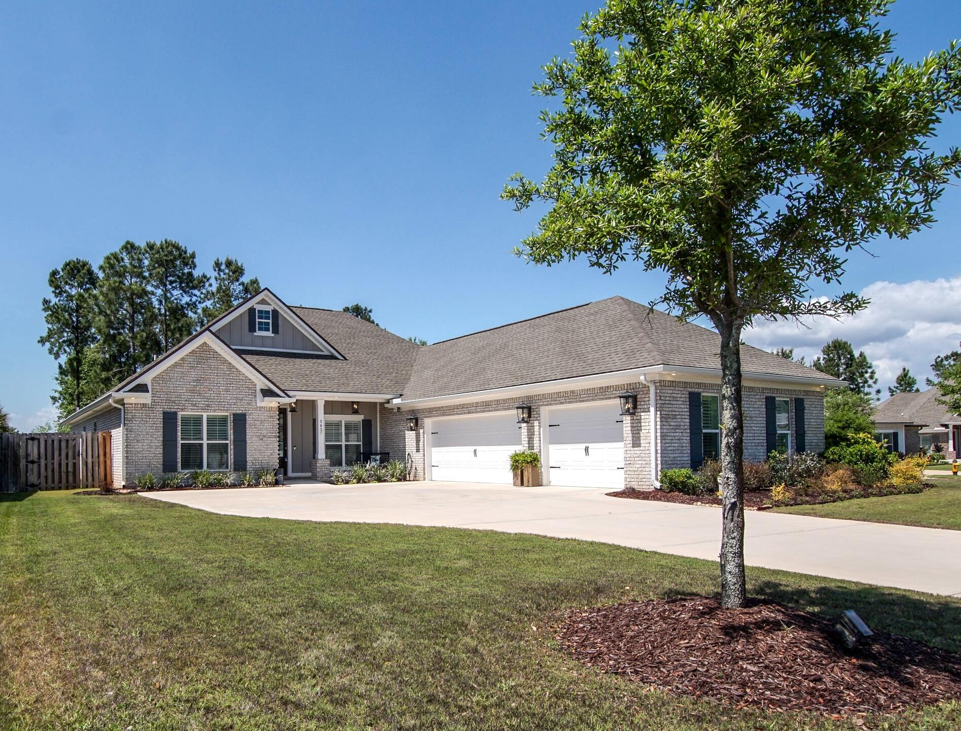**Like new GOLF CART conveys with an acceptable* offer (*seller's sole discretion) and if buyer can close before July 31, 2026.** All your boxes will be checked off starting with: open floor plan that is like new, no stairs,  4bd/3ba, 3-car garage, located near the cul-de-sac, spacious fenced-in yard, large walk-in pantry with wood shelves, plantation blinds in the front, quartz counter tops, beautiful wood cabinets, tankless water heater, pull down attic stairs, electric car charging outlet in garage, gas fireplace, wall oven and gas cook top. At the end of the day, you can relax on the patio under your screen enclosure. This home has a builder upscale package which includes: lights under eaves, wood ceilings on porches, wood cabinets throughout, extra trim inside, smooth finished walls & ceilings, slow close cabinets & drawers, smart home features; like smart switches and more. A must see!