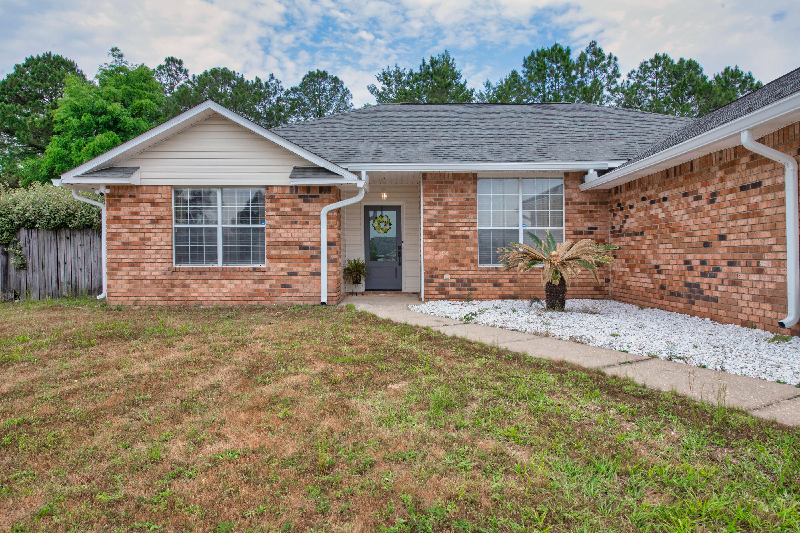 NEW FRONT DOOR AND BACK FRENCH DOORS AS WELL AS UPDATED SEPTIC SYSTEM!
Schedule a showing to view this 3/2 home South Crestview in Countryview Estates! Enter through this home with upgraded LVP flooring offering an open concept floor plan! To the right there is a dining area/flex space. Living room is well sized going to an eat in kitchen space. The kitchen offers updated appliances, pantry, and island for extra prep space! The bedrooms are all well sized, additionally the primary bedroom offers large walk in closet and double vanities! The backyard being oversized is fully fenced! Roof is a few years old! View this home today!