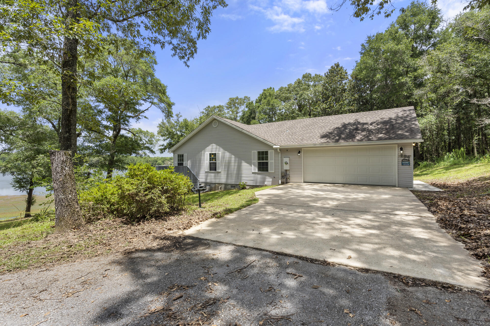 Fully furnished lakefront home with no HOA! Brand new HVAC! Amazing opportunity to rent this home on 5.82 waterfront acres on King's Lake! With 244 waterfront ft and zoned Rural Village (2 units per acre), this 3/2 will make the perfect primary home, second home, short term rental, or profitable investment property. King's Lake is known to be a fantastic fishing lake and is stocked with a variety of fish species, including largemouth bass, bluegill, and catfish. 

DeFuniak Springs is a charming town known for its unique architecture, historic district, fun events, and small-town feel.