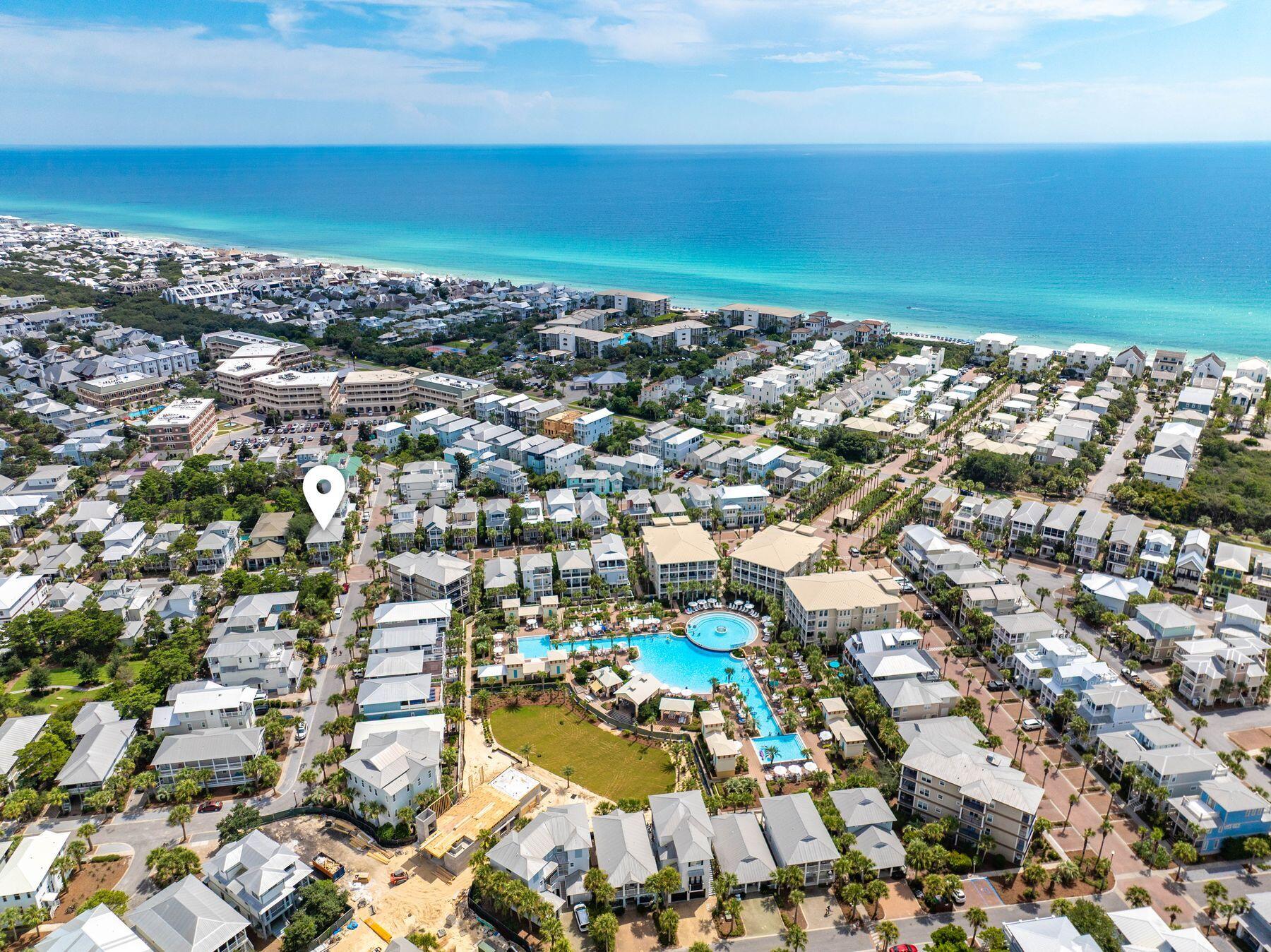 4/27/26 - $50K price reduction. Seller is motivated! Bring your offer for this ideally located 4-bedroom home in Seacrest Beach. Welcome to Shore Thing, a 4-bedroom, 3-bath home offering 2,408 square feet in one of 30A's most sought-after communities. Just one block from the iconic 12,000-square-foot lagoon pool and a short five-minute walk to the shops and dining at Seacrest Beach Village, this property is perfectly positioned for both personal enjoyment and investment potential. The open-concept main level features a bright and inviting living area with hardwood floors, a dining space for eight, and a well-equipped kitchen with a center island for casual meals and entertaining. Also on the first floor are a king bedroom, full bath, and a convenient laundry room. Upstairs, the primary  suite offers a spa-inspired bath with dual vanities, a soaking tub, and a separate shower, along with balcony access complete with a porch swing. Two additional guest rooms, a queen bedroom and a bunk room with twin-over-twin bunks, share a full hallway bath.

Multiple porches provide inviting outdoor living spaces with rocking chairs and cozy seating areas, ideal for enjoying the coastal breeze. Community amenities include deeded beach access with seasonal tram service and the spectacular lagoon-style pool surrounded by palm trees, waterfalls, and ample lounging space.

Offered fully furnished, this home presents an excellent opportunity to personalize and enhance value, with projected rental income of $110,000-$115,000 annually. Ideally situated with convenient access to Rosemary Beach, Alys Beach, and the Timpoochee Trail, this property is a strong contender for a second home or vacation rental along 30A. Buyer to verify all information and dimensions.