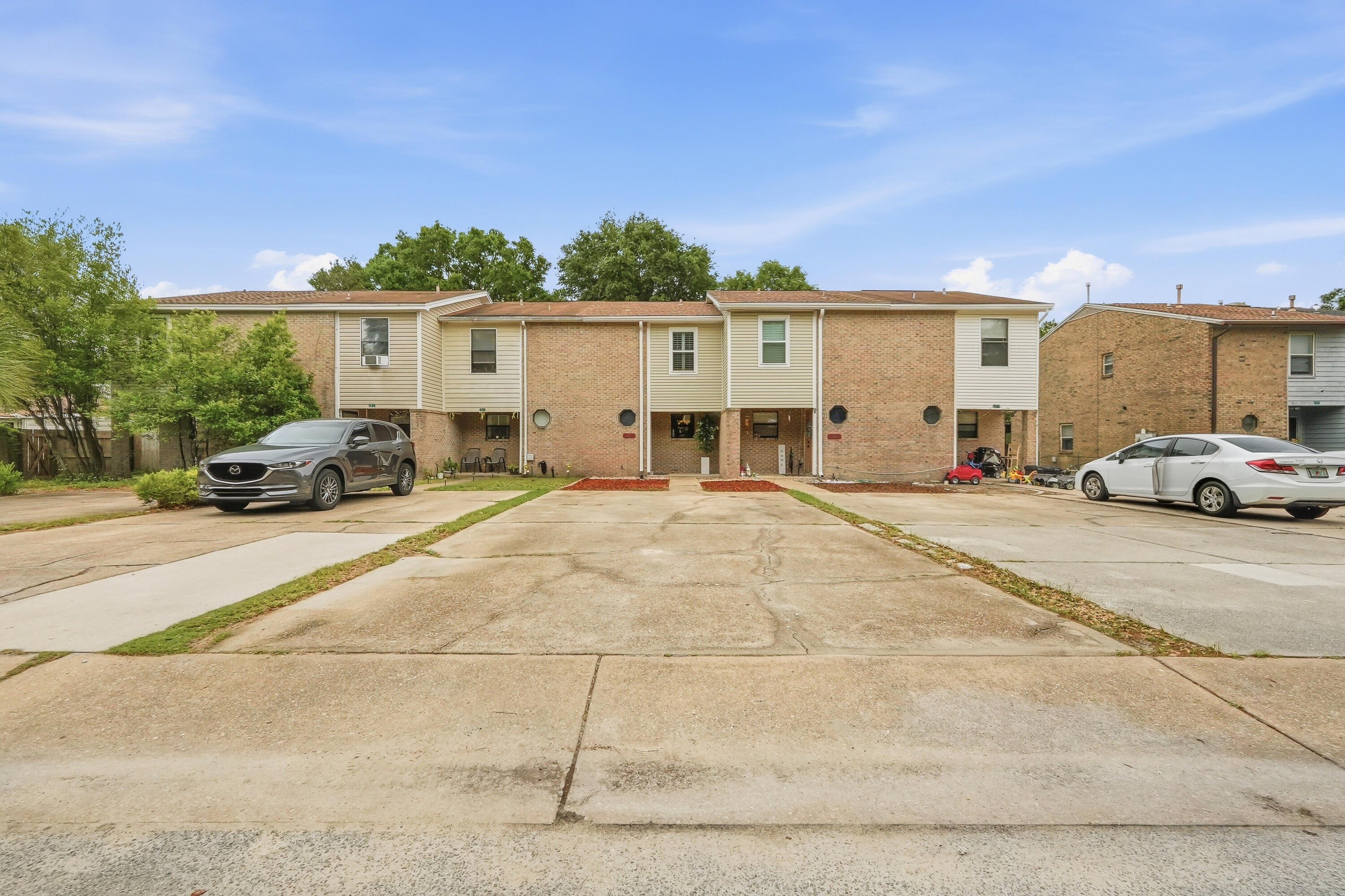 Centrally located in Fort Walton Beach, FL. NO HOA! This spacious 2-bedroom, 1.5-bath renovated townhome offers comfort, convenience, and value all in one.  Located  just 4 miles from the white sandy beaches of Okaloosa Island, less than 6 miles to Hurlburt Field, and 8 miles to Eglin Air Force Base. This beautiful 2 story, 1,204 square ft. townhouse features ceramic tile flooring downstairs, new lighting fixtures, stainless steel kitchen appliances, a full pantry closet, painted cabinets and a window above the kitchen sink filling the space with natural light. The open living and dining area is designed for everyday living and entertaining. Upscale French doors open to the patio and privacy-fenced backyard. The laundry room includes an exterior utility door with direct backyard access for added convenience. Upstairs boasts a spacious primary bedroom with a large walk-in closet, Florida plantation shutters, and private access to the full bathroom. The large second bedroom also includes a walk-in closet and Florida plantation shutters. Additional highlights include plenty of spacious storage closets and a private driveway with 4 parking spaces - an uncommon feature for townhome living. Convenient access to shopping, dining, schools, downtown entertainment, community festivals, and the famous Emerald Coast beaches to fully enjoy the Florida Lifestyle.