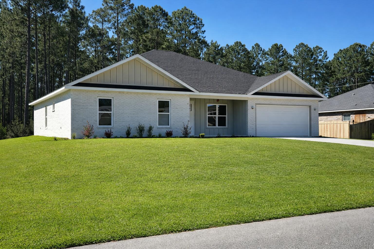 New construction to be completed soon! This exceptional 5-bedroom, 3-bath new-construction home on Bluefish Road in Navarre, FL 32566 was built with quality and livability in mind. The spacious residence offers an open-concept layout, 8-foot doors, and refined finishes throughout. The impressive kitchen features ceiling-to-floor cabinetry, a generous pantry, and beautiful countertops-perfectly blending style and function for everyday living or entertaining. The split floorplan provides privacy, with the primary suite offering a spa-inspired bath and generous walk-in closet. Four additional bedrooms provide flexibility for family, guests, or creative use such as an office, gym, or hobby space. A well-appointed laundry room with sink adds convenience, and the thoughtful craftsmanship ensure energy efficiency and long-term value. This home is located in Flood Zone X (low flood risk). Situated in a desirable area with close proximity to schools, shopping, and local amenities, this brand-new home delivers the perfect balance of modern design, timeless comfort, and dependable quality--ready for its first owners to call home. Buyer will have the opportunity to select several finishes and upgrades with the builder (including bathroom mirrors, lighting, kitchen backsplash, appliances, exterior colors, and more).Note: Photos shown are of a similar completed build (not the actual Bluefish Road home) and have been virtually staged for illustrative purposes. The actual home is currently under construction and will be completed soon.