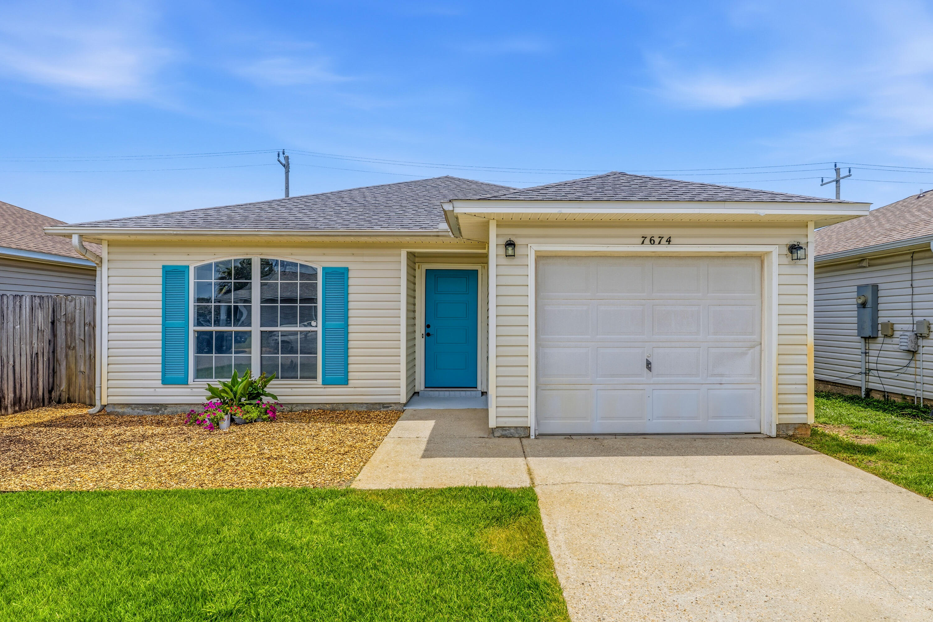 Welcome to this move-in-ready Florida cottage in West Navarre! This home checks every box with its prime location, extensive updates, energy-efficient features, affordability, and low-maintenance lifestyle. Perfect as a primary residence, vacation getaway, or profitable short-term rental investment. NO HOA! The open-concept floor plan features a spacious living room and kitchen with a breakfast island, stainless steel appliances (2025), and modern vinyl plank flooring throughout (2024). Major upgrades include a new roof (2022), energy-efficient split A/C units with R/C in every bedroom (2025), new ceiling fans with R/C (2026). New front door, bedroom doors, and sliding glass back door (2026). The primary suite offers a walk-in closet, dual vanities with new countertops (2026), and a relaxing garden tub. Step outside to the large covered concrete patio, perfect for grilling and entertaining. Additional updates include fresh interior paint, new window blinds (2026), Zoysia sod with irrigation (2025), and the washer and dryer are included. Conveniently located just minutes from Navarre Beach, shopping, dining, and schools, this beautifully updated home is truly move-in ready.