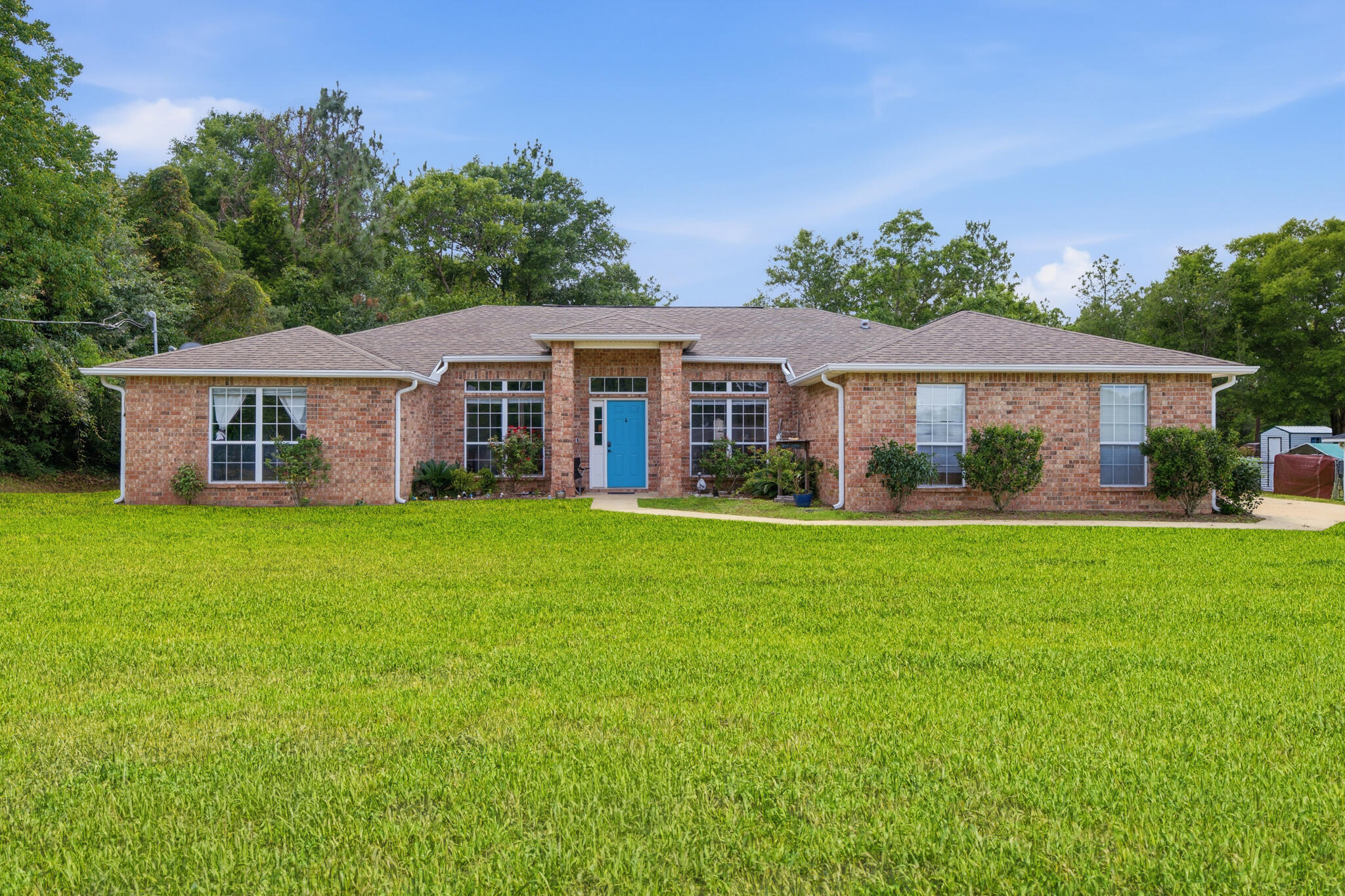Tucked away in Silver Springs Estates in North Crestview, this spacious 4-bedroom, 2-bath home offers something that's surprisingly hard to find in Florida: rolling hills, mature trees, and a sense of space both inside and out.

Situated on a generous 0.64-acre lot, this property provides room to spread out while still being conveniently located to everything Crestview has to offer. From the moment you arrive, you'll notice the natural elevation changes throughout the neighborhood, creating a setting that's both unique and picturesque.

Inside, the split floor plan is designed for comfortable everyday living. You'll find a dedicated office, formal dining room, and an open-concept living area that flows seamlessly into the kitchen. Granite countertops, a center prep island, matte black Samsung appliances, and a large corner pantry make the kitchen both functional and inviting.

The private primary suite serves as a relaxing retreat with an updated bathroom featuring a tiled walk-in shower with glass enclosure, dual walk-in closets, and additional storage space. Wood-look flooring and tile throughout the main living areas add both style and durability.

Step outside and discover one of the home's most impressive features. The backyard extends approximately 150 feet beyond the patio, creating an outdoor space that's rarely found at this price point. Mature trees, a fire pit area, and plenty of room for entertaining, gardening, pets, or simply enjoying the  privacy make this property feel even larger than its already generous lot size suggests.

If you've been searching for a home with space, functionality, and value, this may be the opportunity you've been waiting for.

Short sale. Sale is subject to lender approval.