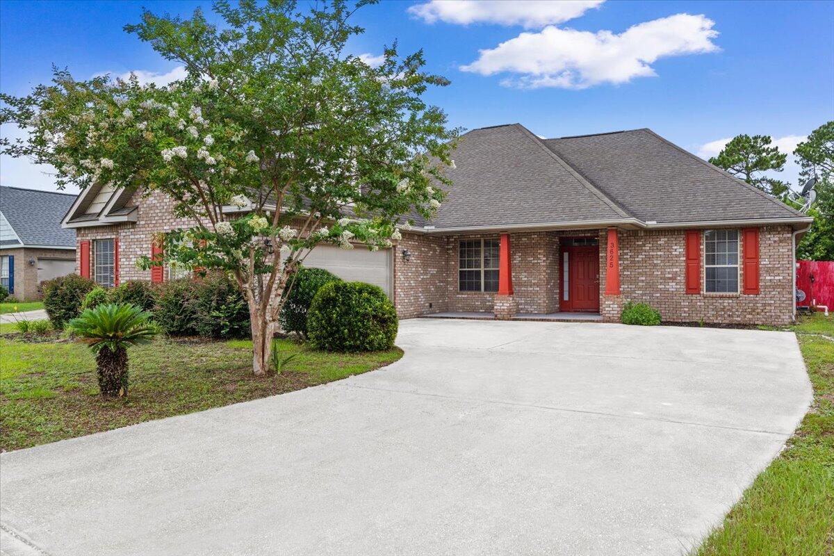 CONTEMPORARY CRAFTSMAN WITH FLEXIBLE LIVING SPACES AND ROOM TO GROW. Welcome home to this thoughtfully designed Contemporary Craftsman featuring a desirable split-bedroom floor plan and an open-concept layout perfect for modern living. The spacious living room flows seamlessly into the well-appointed kitchen, creating an inviting space for entertaining family and friends. Just off the foyer, the formal dining room offers exceptional versatility. Complete with French doors at both entrances, this space can easily serve as a private home office, playroom, homeschool area, or formal dining space to fit your lifestyle. Tucked away on one side of the home are two generously sized guest bedrooms with large closets and a full bathroom, providing comfort and privacy for family members or visitors. The private primary suite offers a relaxing retreat and features recently updated carpeting, trey ceiling, and a walk-in closet in the primary bath. Conveniently located off the two-car garage, the oversized laundry room provides abundant storage and functionality. Upstairs, the finished room over the garage (FROG) serves as an ideal fourth bedroom, bonus room, media room, or home gym. Recent updates include fresh interior paint and new carpet in the primary suite and one secondary bedroom. With solid bones, a highly functional floor plan, and plenty of opportunity to add your personal style, this home presents an excellent opportunity to create the space you've always envisioned.