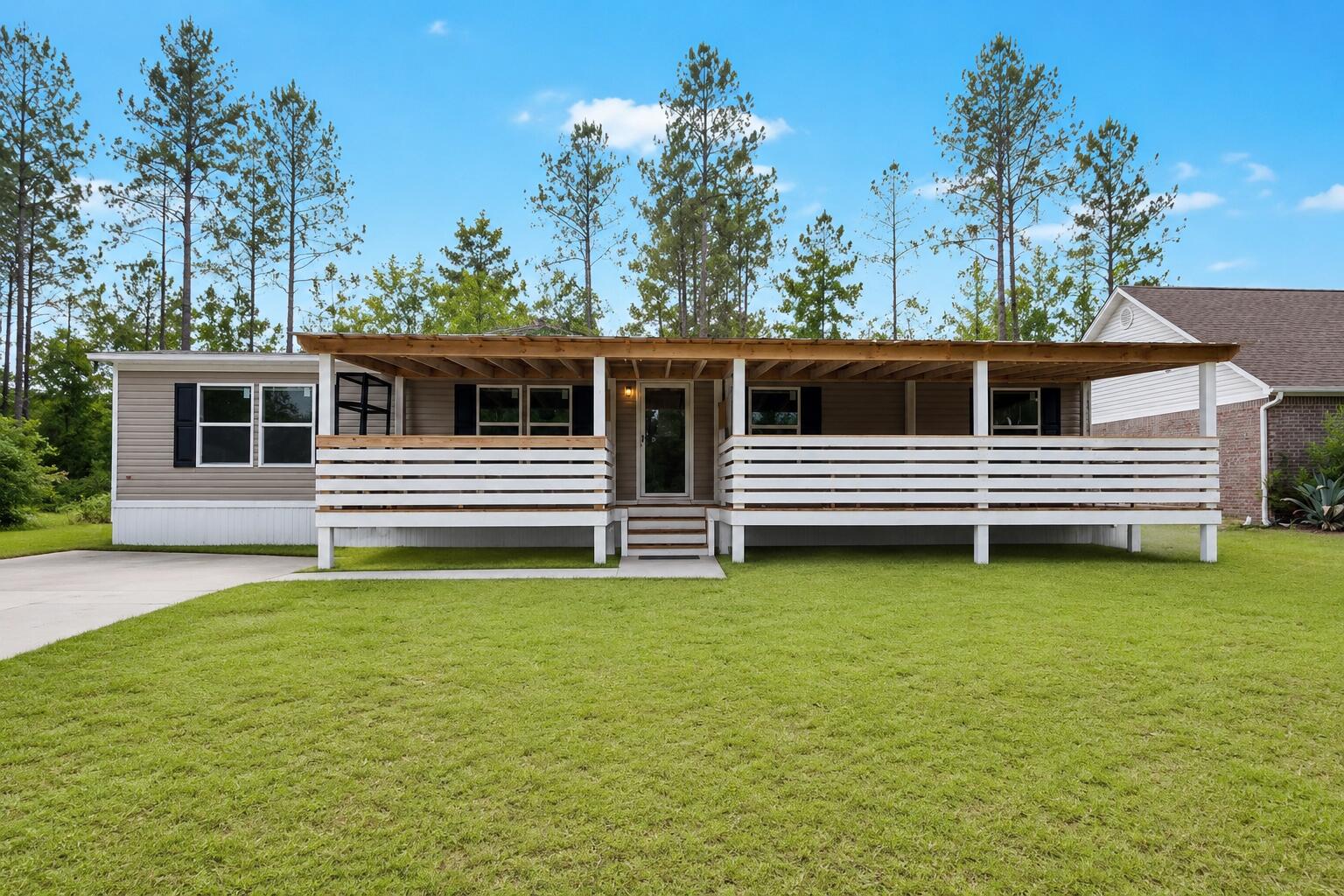 Located in the heart of Santa Rosa Beach, 241 N Eden Park Drive offers a rare combination of waterfront living, convenient access to the area's most sought-after destinations, and the added value of an included travel trailer. Offering flexibility for personal use, guest accommodations, or potential rental income, this unique addition creates opportunities rarely found at this price point. Just minutes from the beaches of 30A, local restaurants, shopping, and public boat launches, this location puts the best of the Emerald Coast right at your fingertips.

Situated along a peaceful canal, the property provides direct access for kayaking, paddleboarding, and exploring the surrounding waterways, with North Eden Park and Choctawhatchee Bay just around the corner. Whether you're spending the day on the water or heading to the beach, outdoor recreation is always within easy reach.

Built in 2022, this well-maintained 4-bedroom, 2-bath home features an open floor plan designed for comfortable everyday living. LVP flooring runs throughout the home, while the spacious kitchen, living, and dining areas create an inviting space for gathering with family and friends. The primary suite offers a generous walk-in closet, and furnishings are negotiable for those seeking a move-in-ready opportunity.

Whether you're searching for a primary residence, second home, or investment property, this is an opportunity to enjoy the coastal lifestyle at an attractive price point in one of Santa Rosa Beach's most convenient locations. Between the canal-front setting, proximity to the beach, and included travel trailer, this property offers a level of versatility that is difficult to find in today's market.