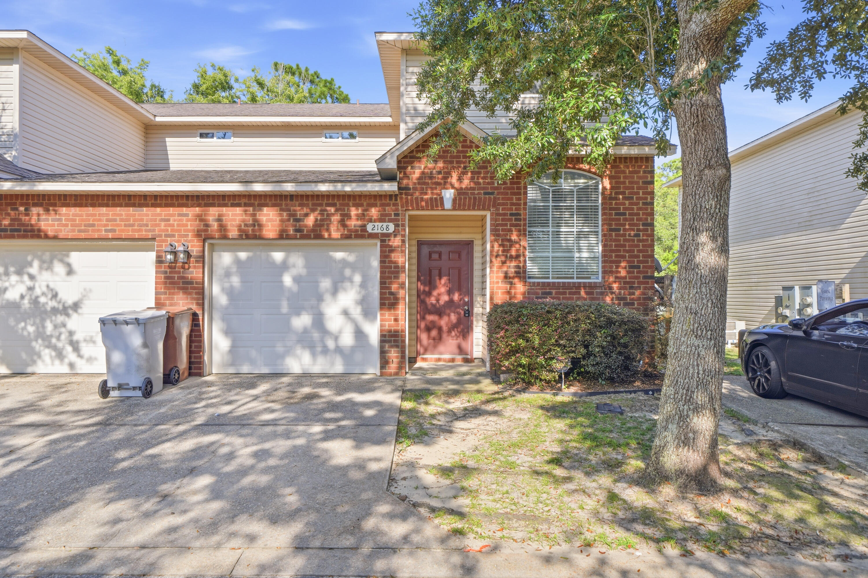 Welcome to this beautifully renovated 3-bedroom, 3-bath townhome in desirable East Navarre - a rare end unit offering modern updates, a flexible layout, and an unbeatable coastal location. 

Step inside to find soaring 9-foot ceilings, crown molding, recessed lighting, and brand new flooring, fresh paint, and light fixtures throughout. The open-concept kitchen features a breakfast bar, stainless steel Kenmore appliances, and custom pendant lighting, perfect for everyday living and entertaining.
This sought after end unit includes guest parking immediately adjacent to the driveway and a versatile layout with a first floor bedroom and full bathroom on the main level - ideal for guests or multi-generational living. Upstairs, the spacious primary suite offers two closets, a cultured marble vanity, and a private en suite bathroom. A third bedroom and full guest bath complete the upper level.

Loaded with extras, this home includes a brand new GE washer and dryer, vinyl plank stair treads with built-in storage, and an enlarged outdoor patio. Major systems are updated with a new roof coming in 2026, HVAC replaced in 2022, and water heater in 2018.

Just minutes from the Gulf beaches and close to military bases, schools, shopping, and dining. Don't miss this exceptional opportunity, schedule your showing today!