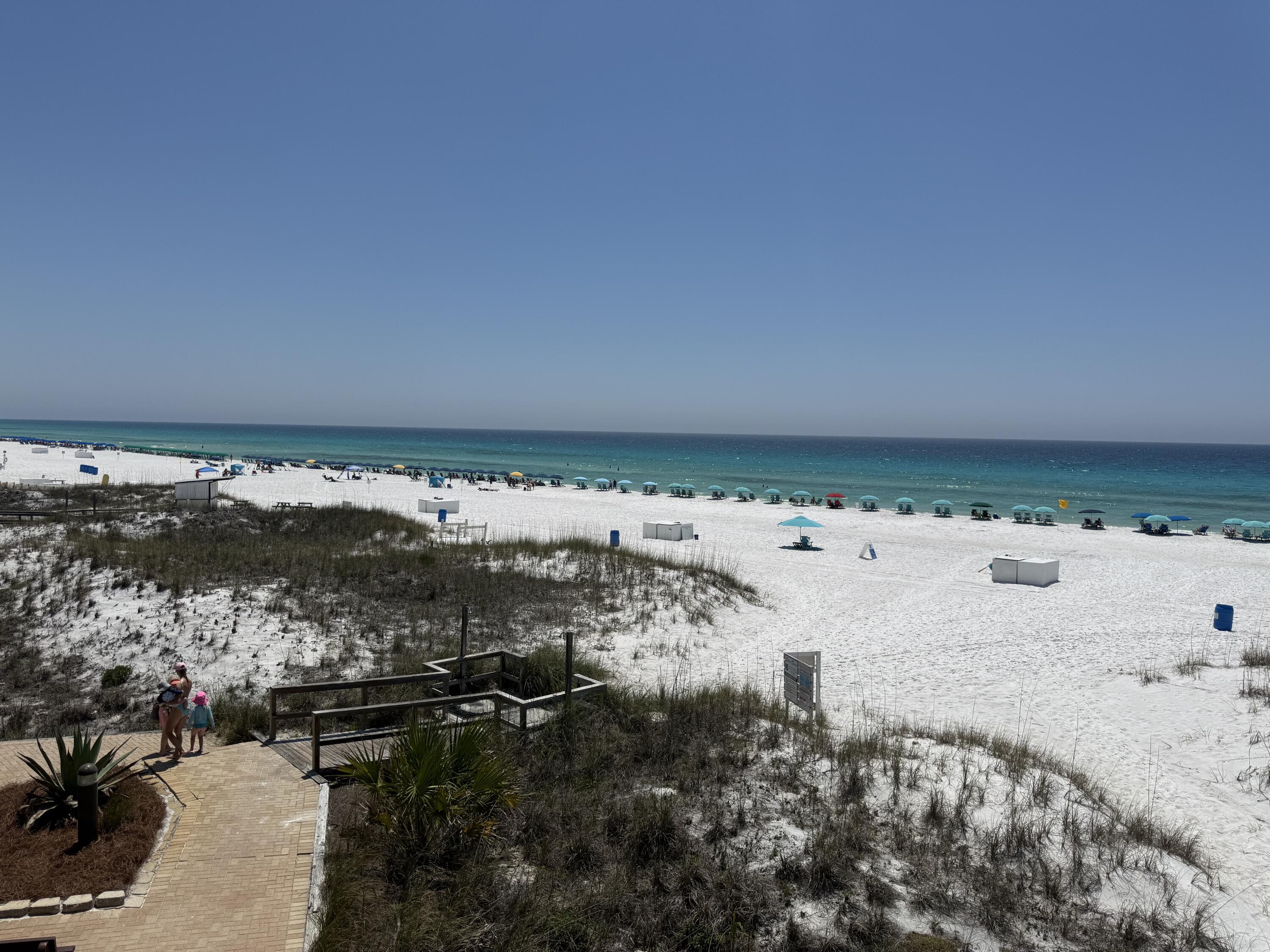 This ground floor unit allows straight to the incredible white sand beaches of the Gulf without crossing a road. This one bedroom unit has many updates.  Hallway wall removed to create a large bedroom, washer/dryer installed which guests love, spa quality bathroom, updated kitchen, tile floors, newer sliding door, beautiful plantation shutters, and quality furniture! Super popular first floor condo!  No steps and a easy 75 yard walk to beach.  Condo comes with a beach storage locker and is right next to the community pool and BBQ grills.  Resort is GATED and offers a Game Room, Tennis, Basketball, Pickleball, Fitness Center and Shuffleboard.  Silver Dunes has one of the best (if not the best) planned social calendars for Guests: this is where family memories are made!